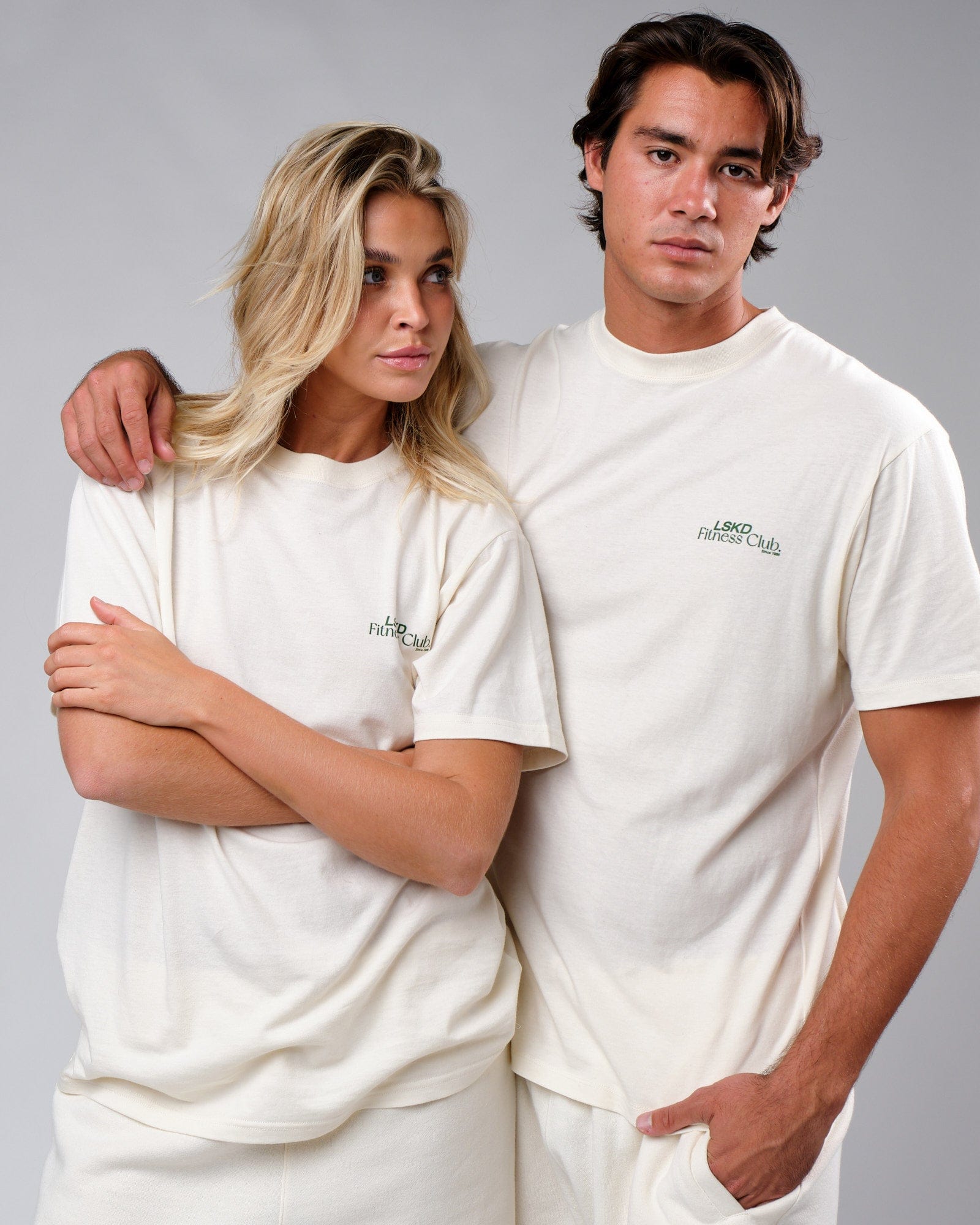 Model wearing Unisex Uplift Tee Oversize - Cream