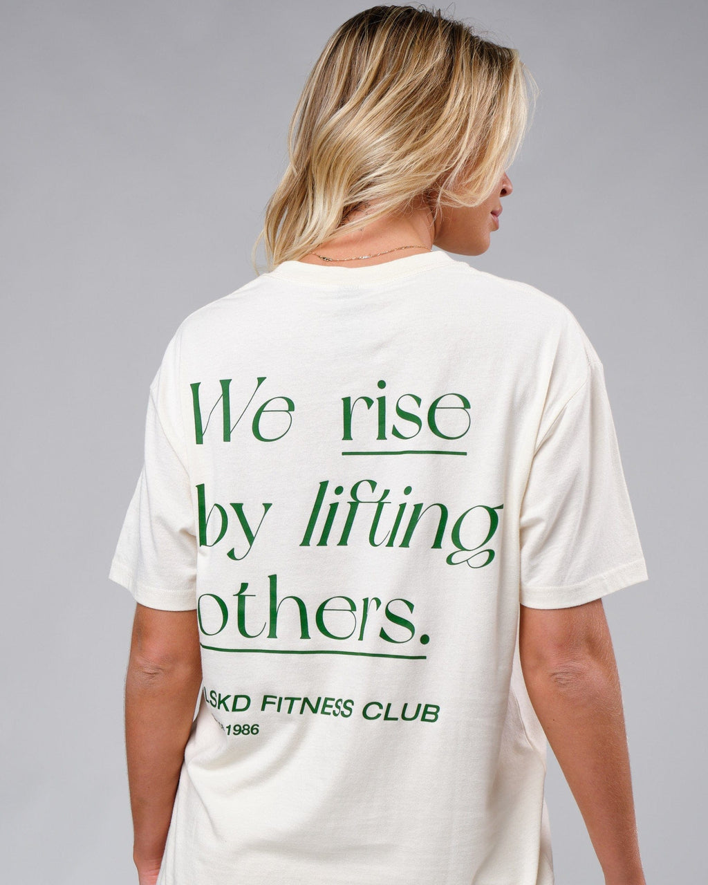 Model wearing Unisex Uplift Tee Oversize - Cream