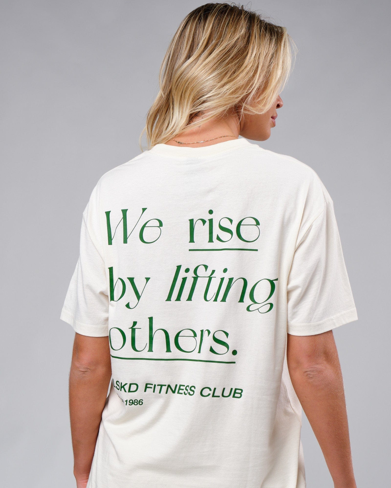 Model wearing Unisex Uplift Tee Oversize - Cream