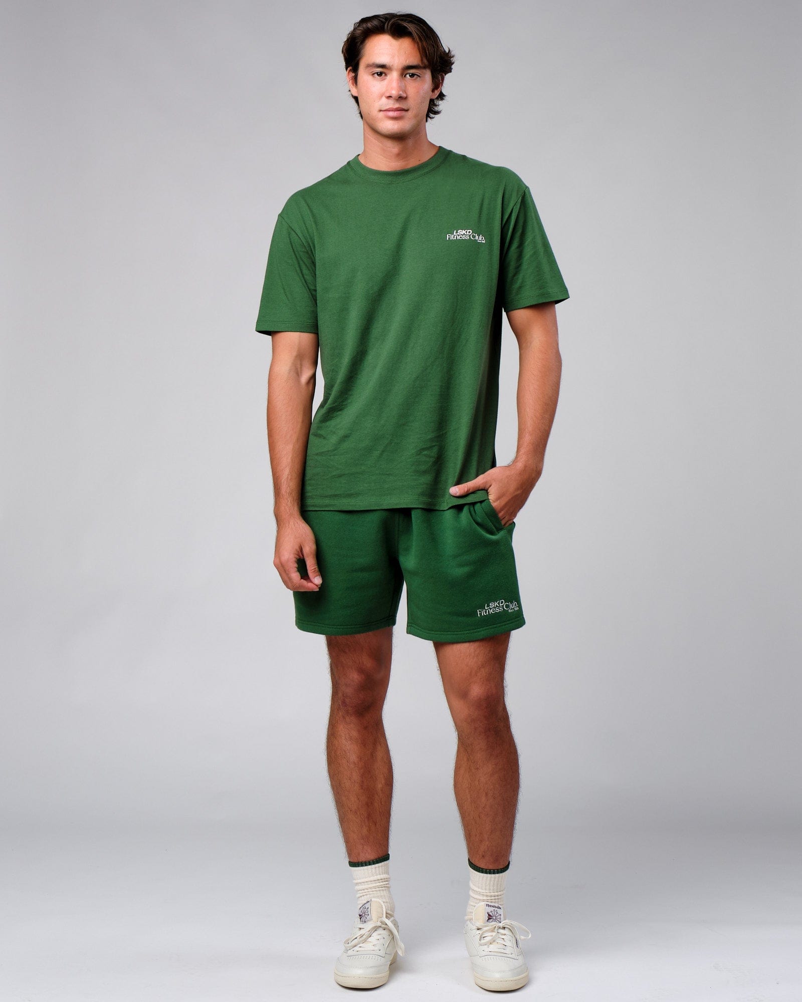 Model wearing Clubhouse Track Short - Eden Green