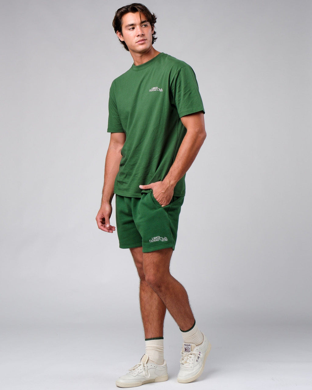 Model wearing Clubhouse Track Short - Eden Green