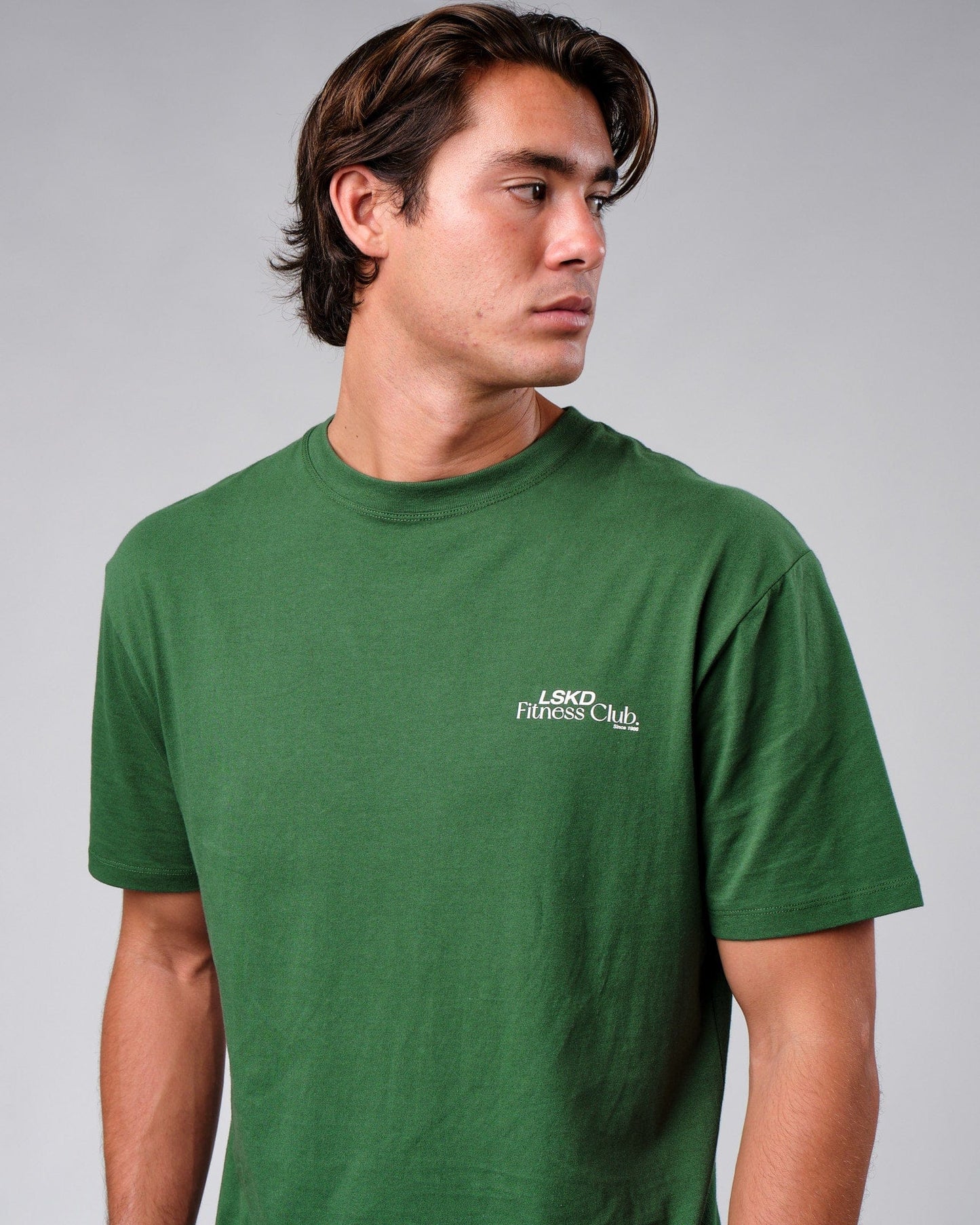 Model wearing Uplift Tee Oversize - Eden Green