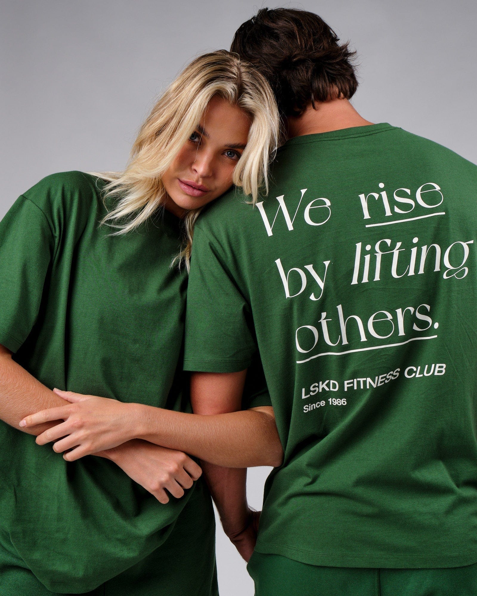 Model wearing Unisex Uplift Tee Oversize - Eden Green