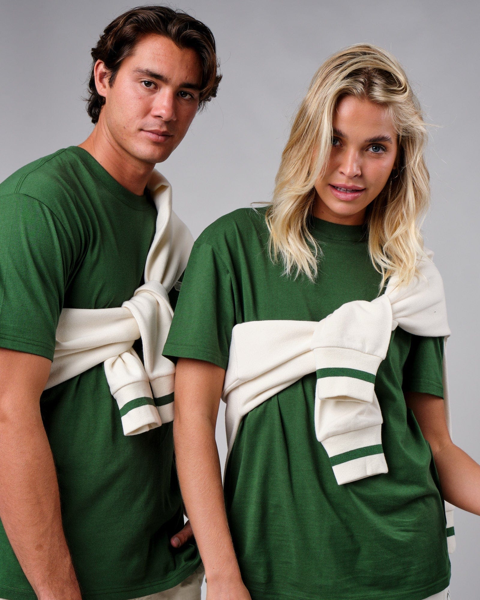 Model wearing Unisex Badge Tee Oversize - Eden Green