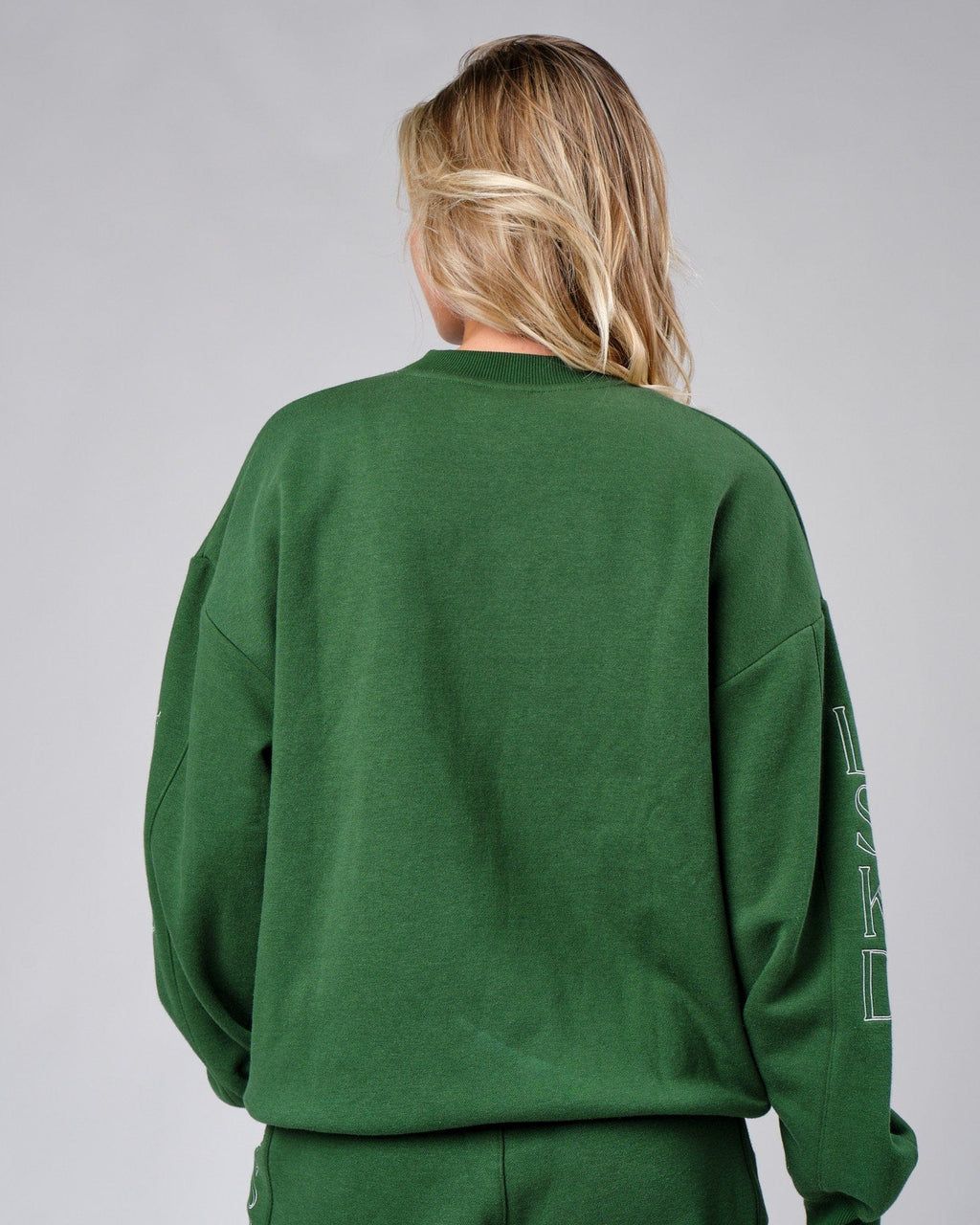 Model wearing Court Sweater Oversize - Eden Green