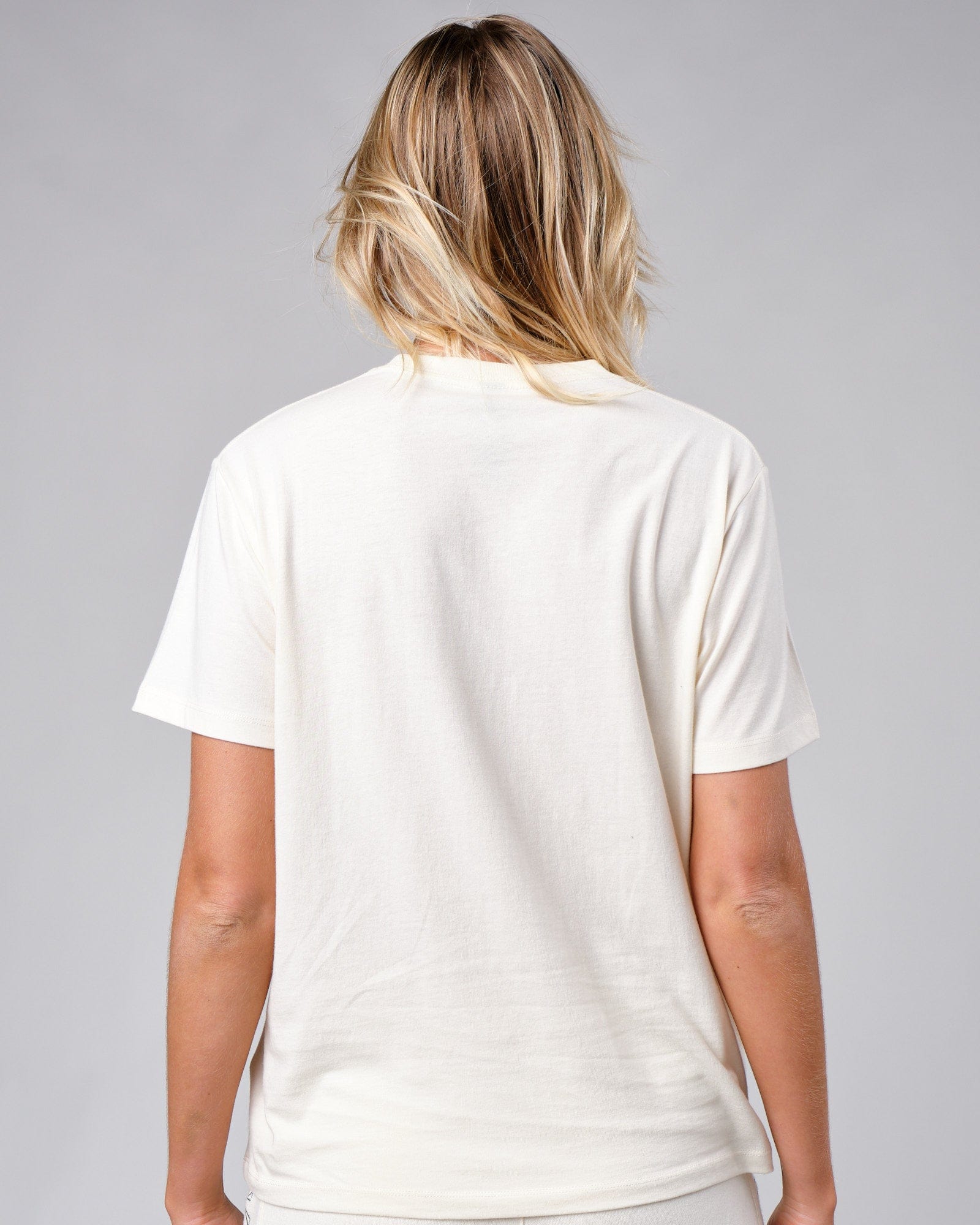 Model wearing Clubhouse Tee - Cream