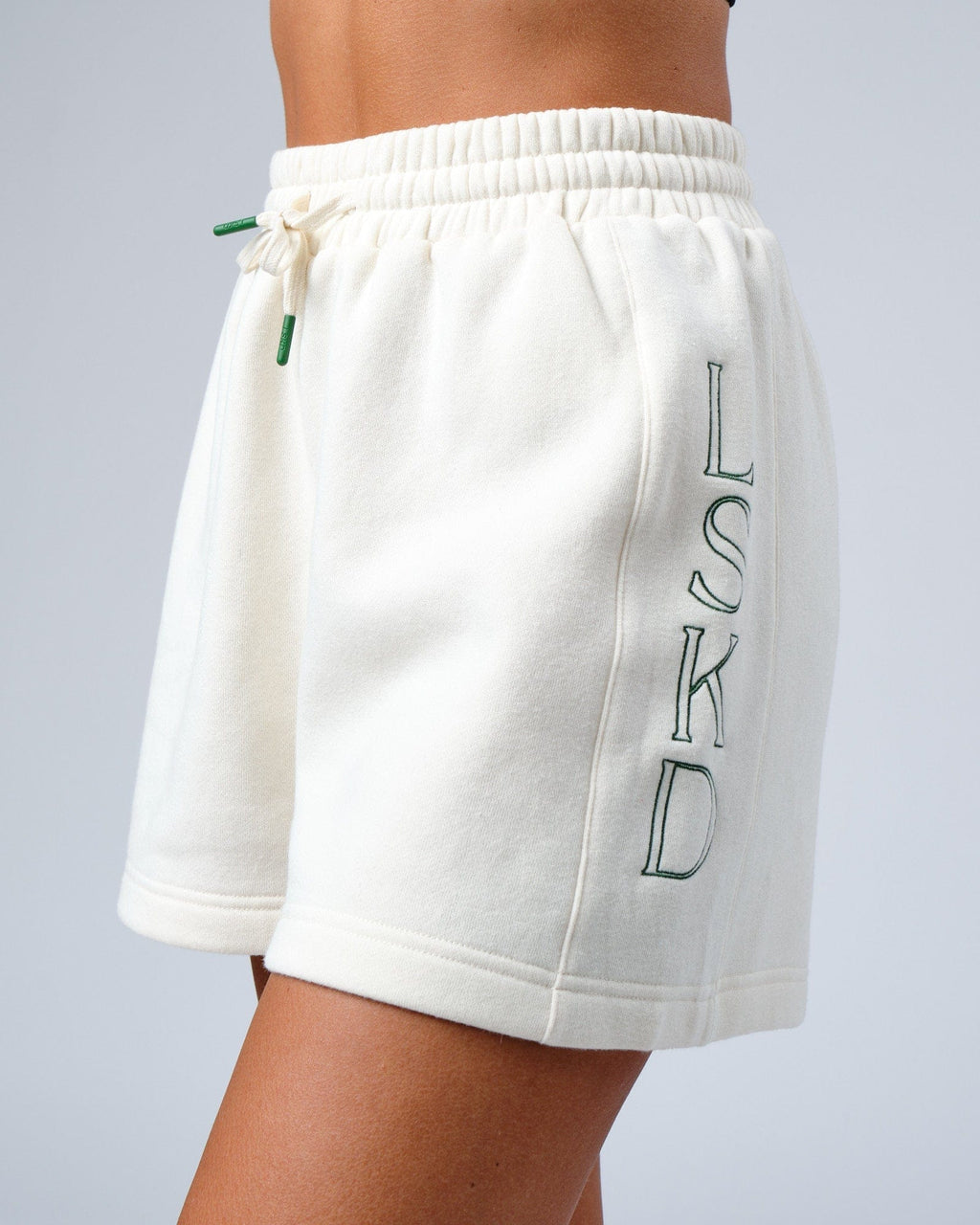 Model wearing Court Lounge Short - Cream