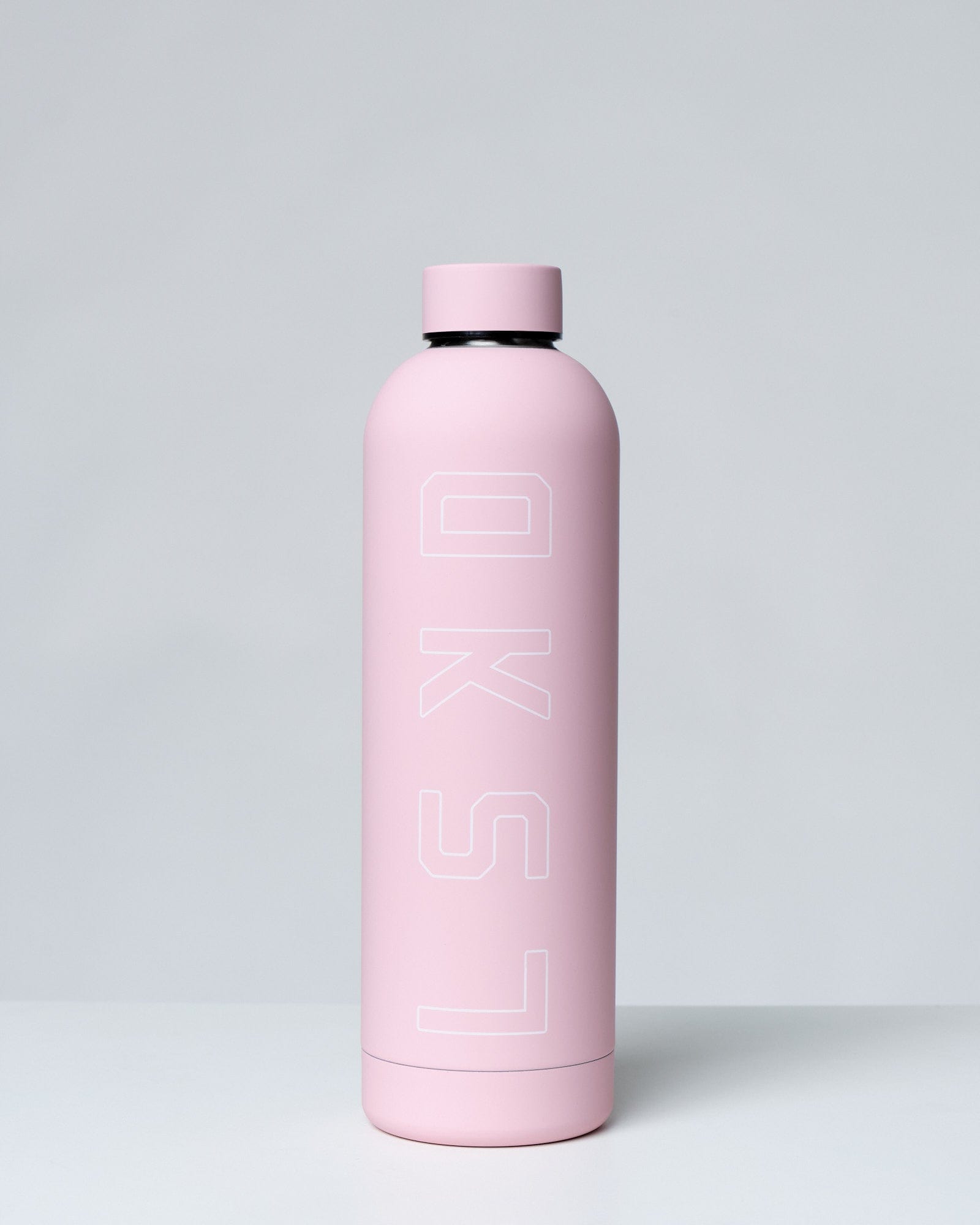 Model wearing Tidy Bottle - Petal Pink