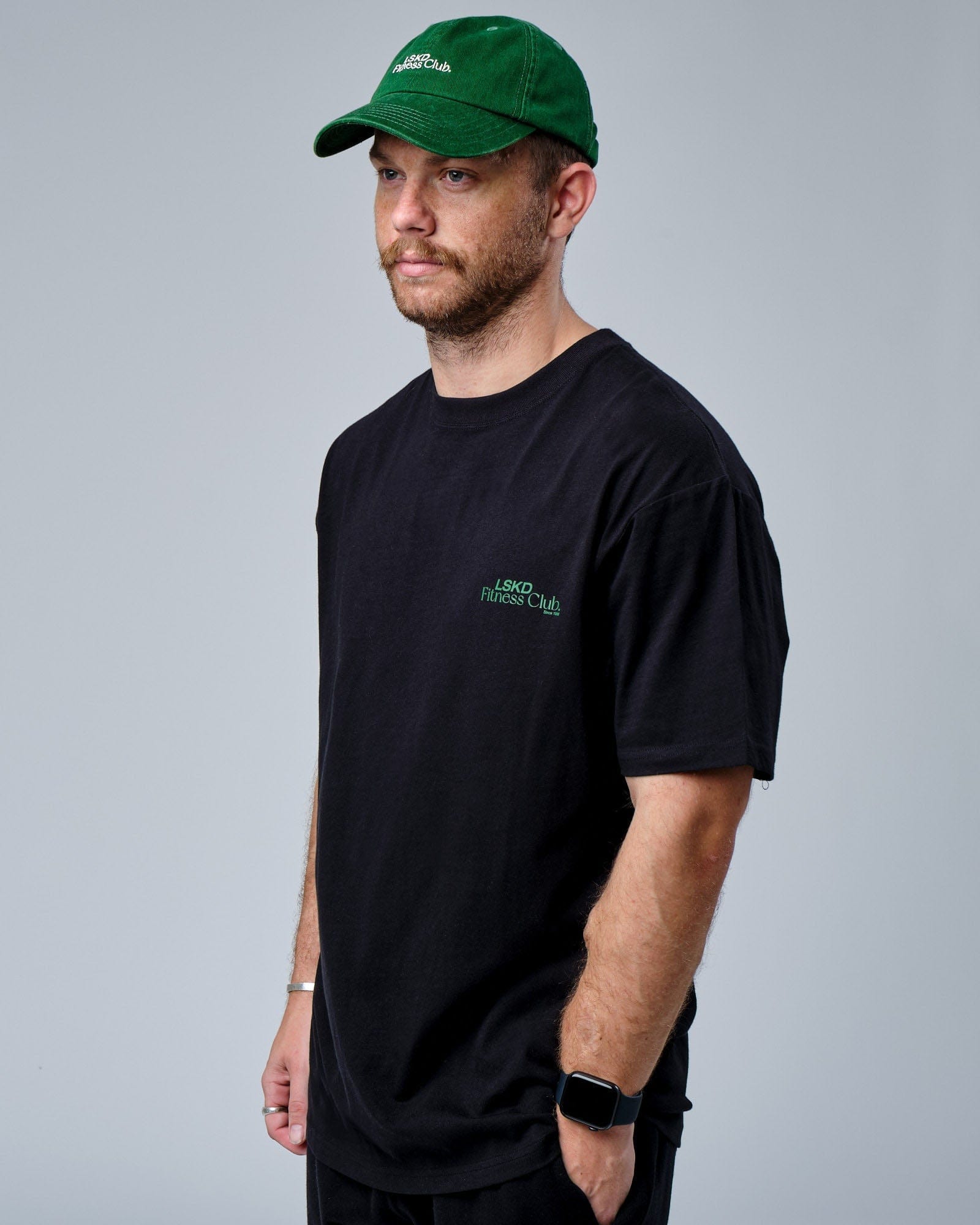Model wearing Social Cap - Washed Eden Green