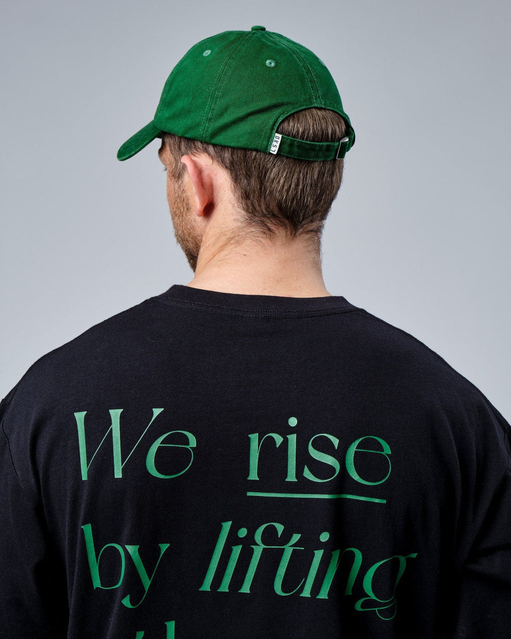 Model wearing Social Cap - Washed Eden Green