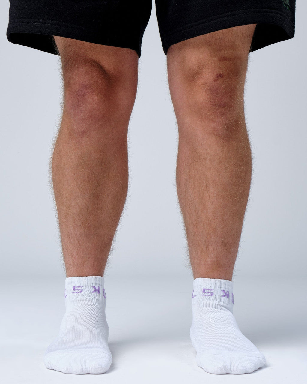 Model wearing Base Quarter Sock - White-Cosmic Sky