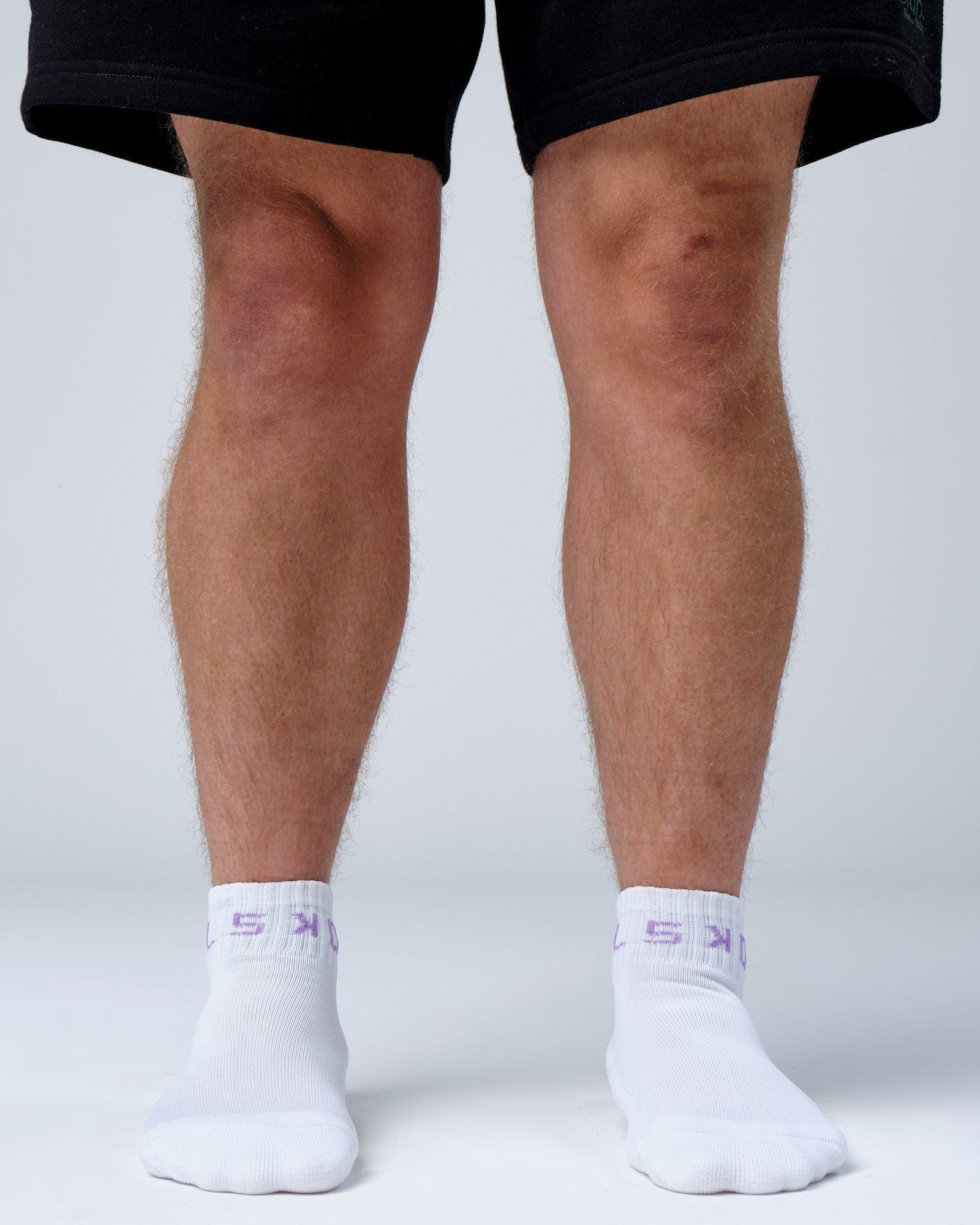 Model wearing Base Quarter Sock - White-Cosmic Sky