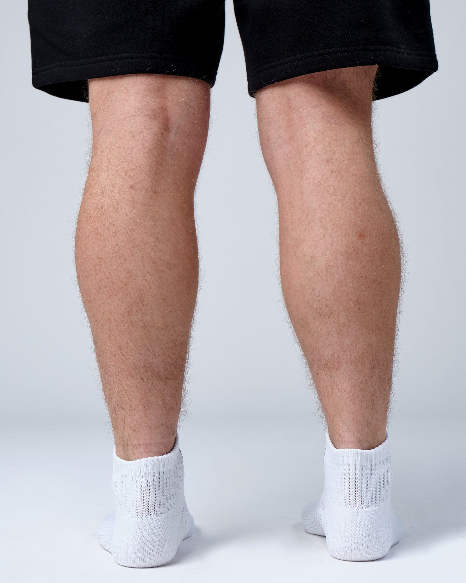 Model wearing Base Quarter Sock - White-Cosmic Sky