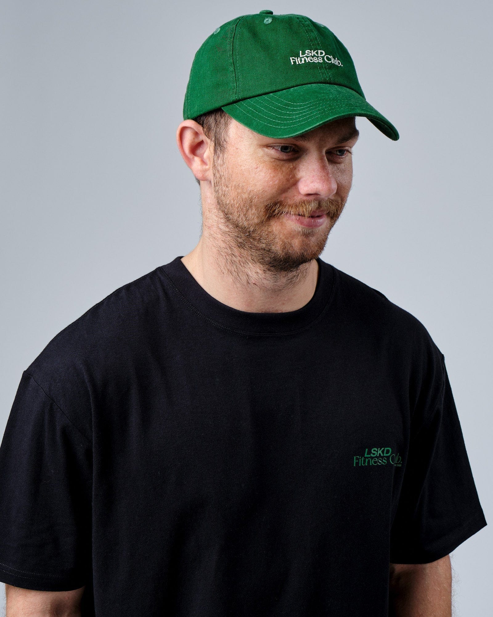 Model wearing Social Cap - Washed Eden Green