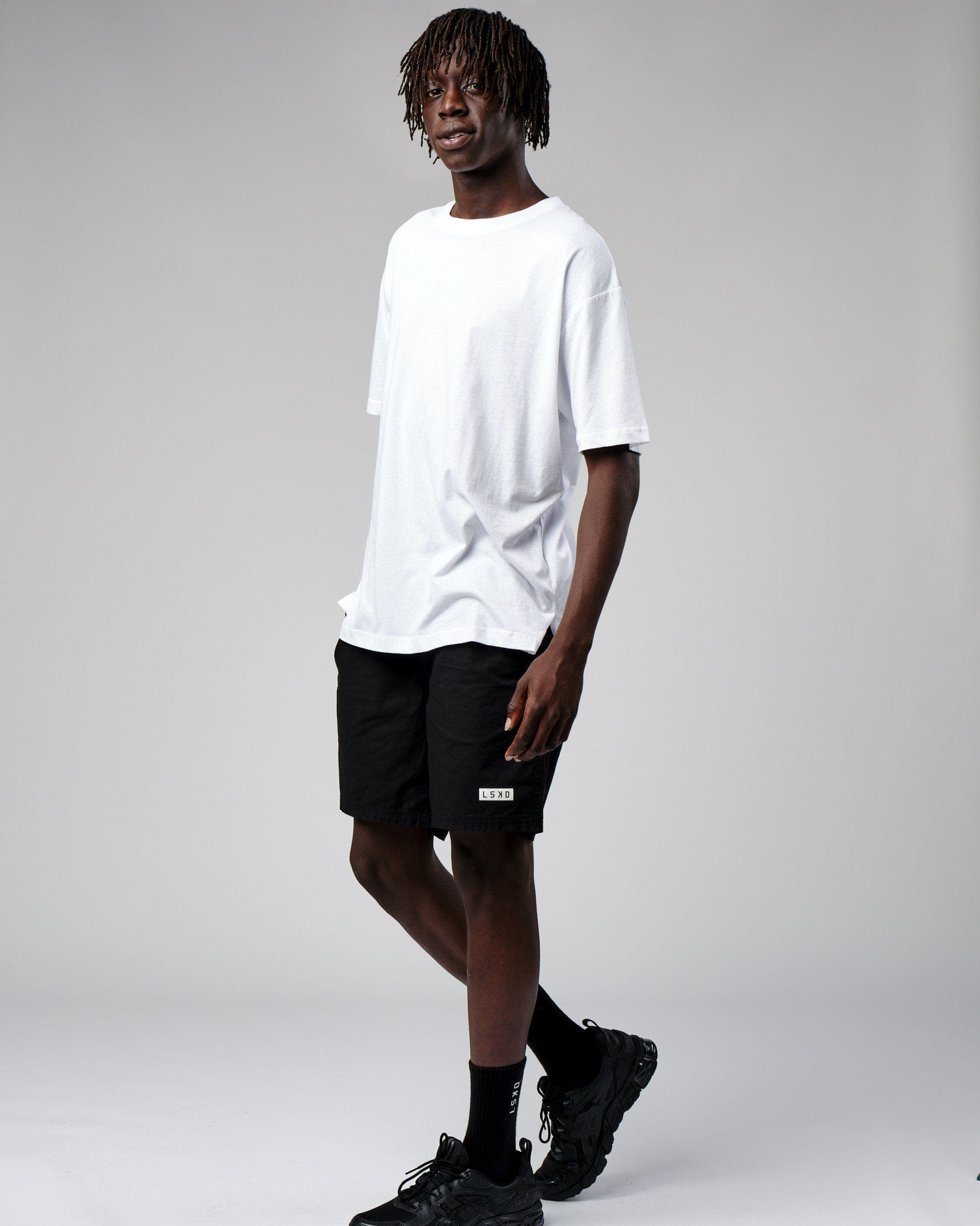 Model wearing Span Tee Oversize - White