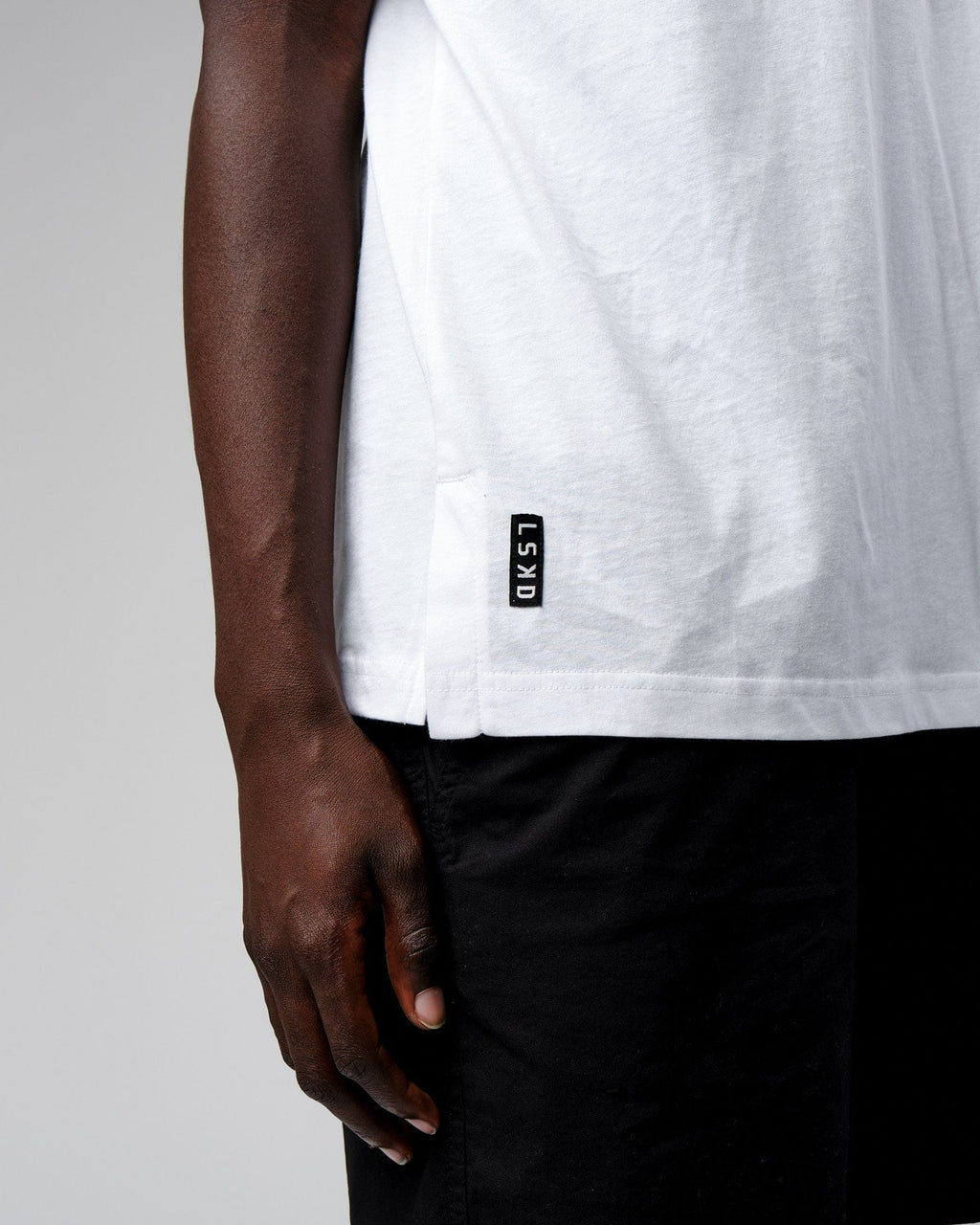 Model wearing Span Tee Oversize - White