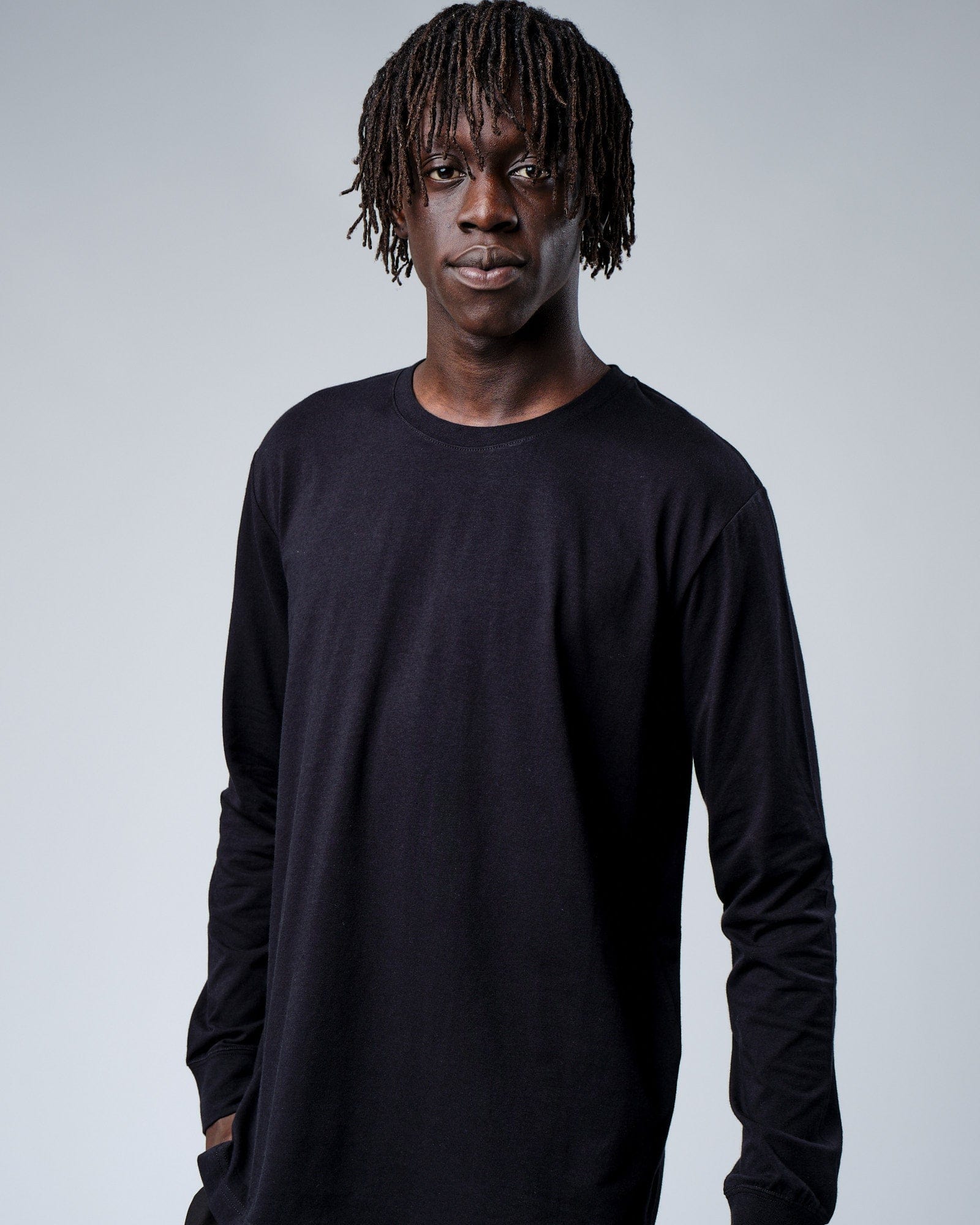 Model wearing Intensity FLXDRY Performance LS Tee - Black