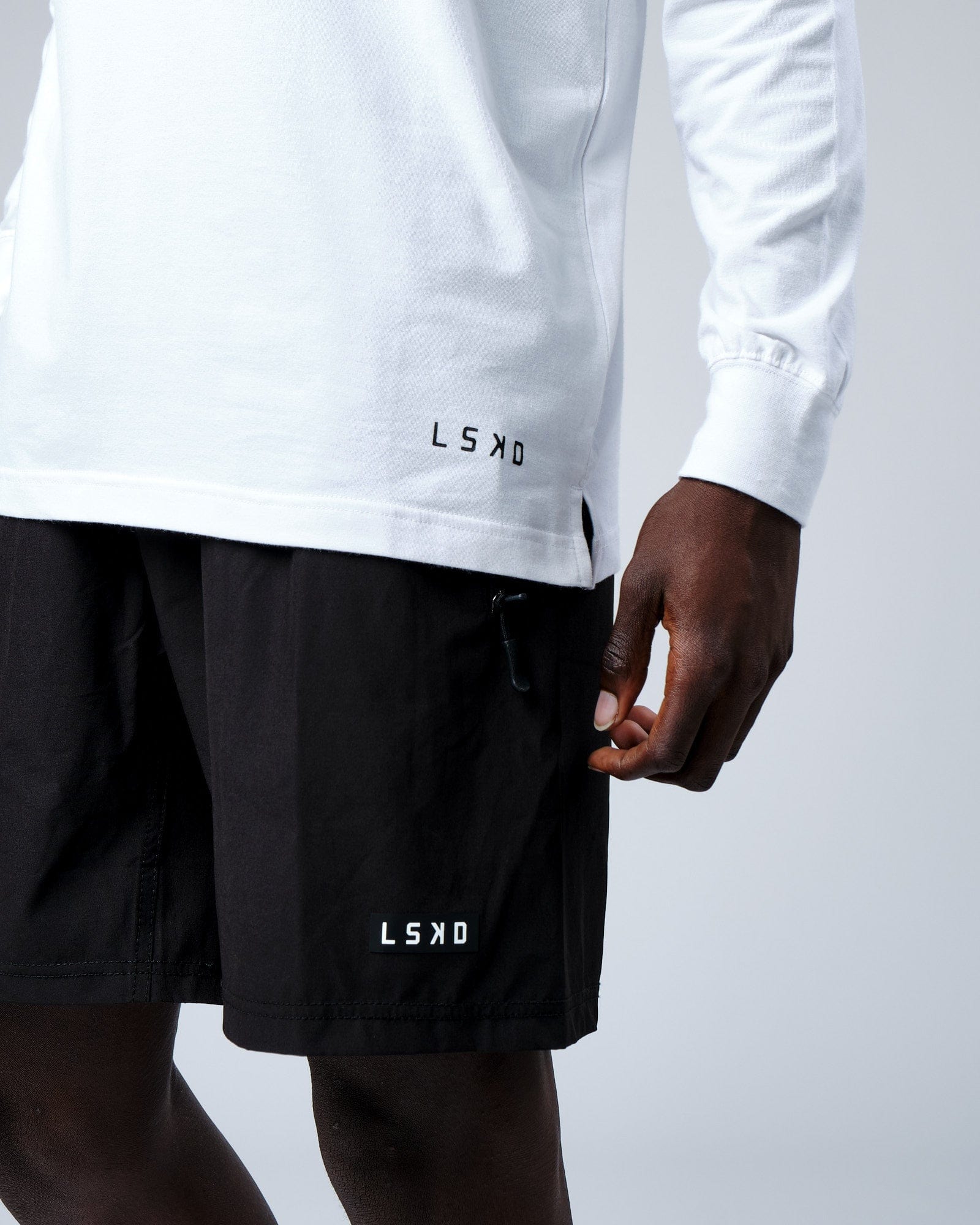 Model wearing Intensity FLXDRY Performance LS Tee - White