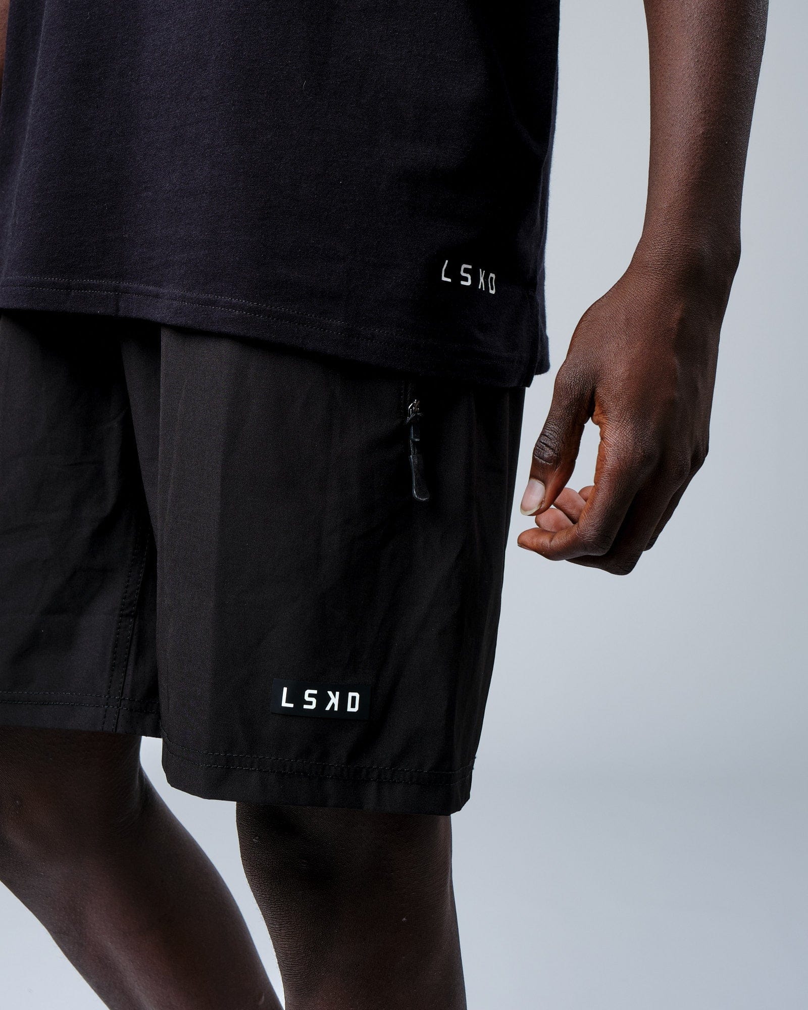 Model wearing Intensity FLXDRY Performance Tee - Black