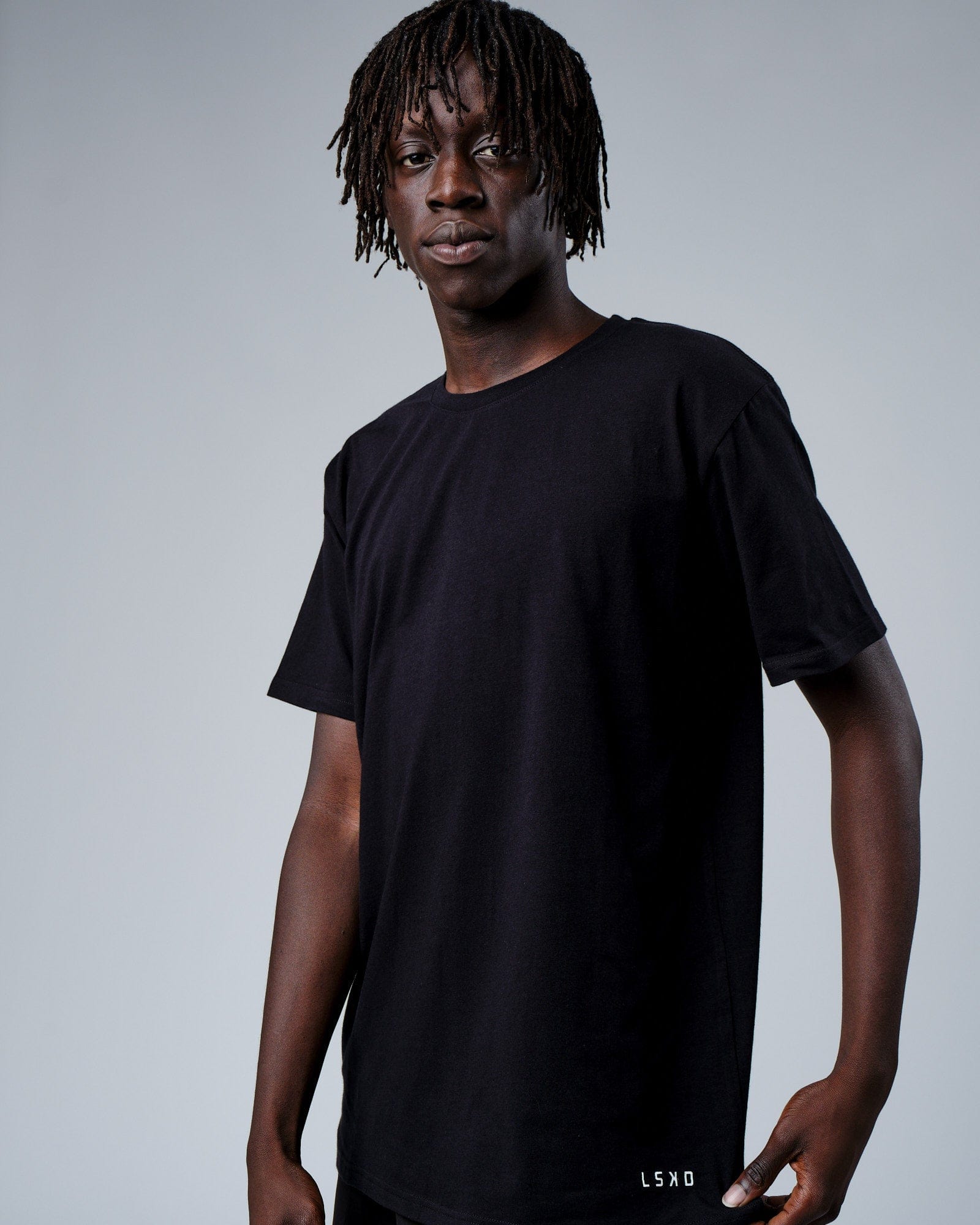 Model wearing Intensity FLXDRY Performance Tee - Black