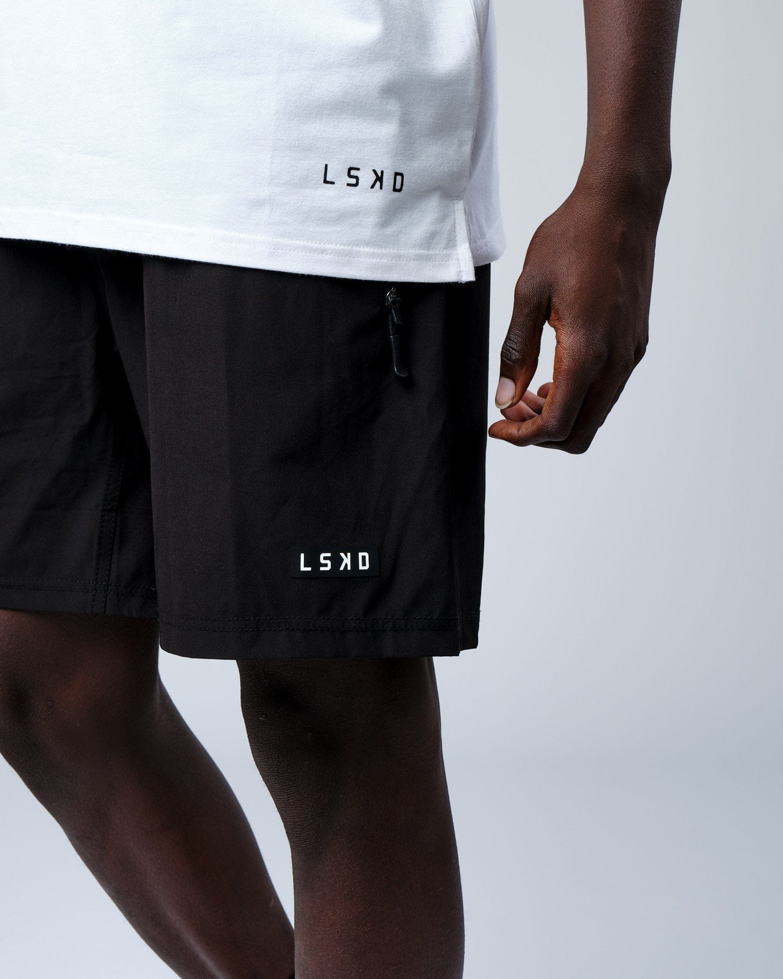 Model wearing Intensity FLXDRY Performance Tee - White