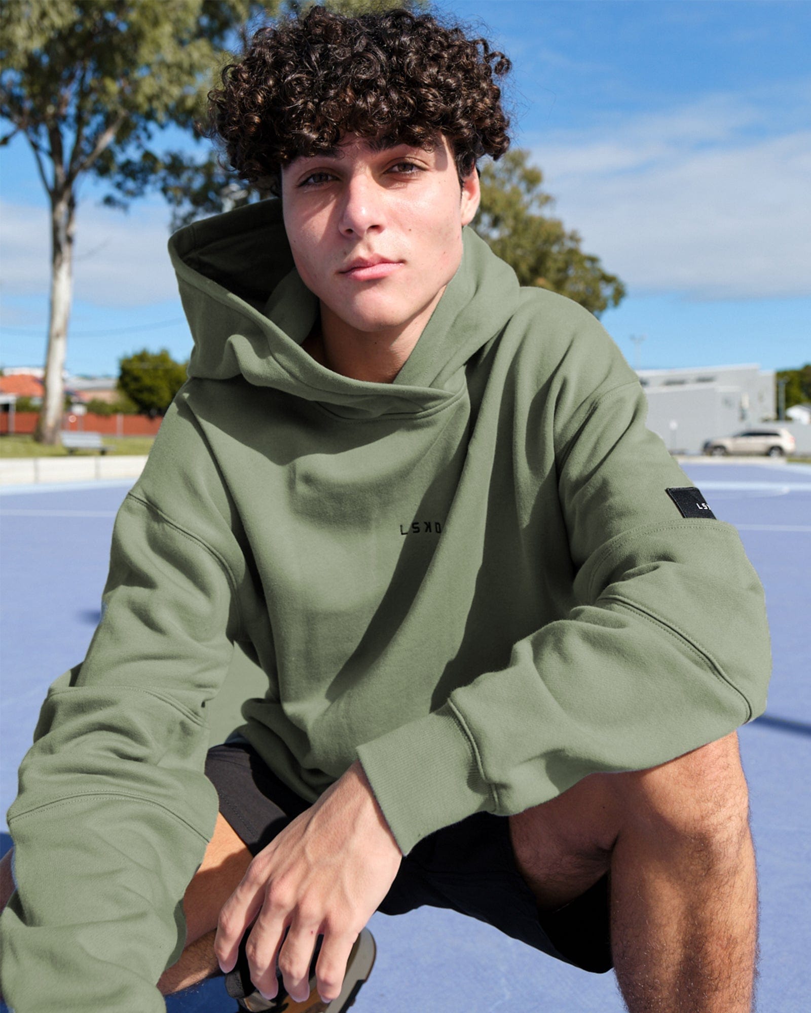 Model wearing Upfield Hoodie Oversize - Sea Spray