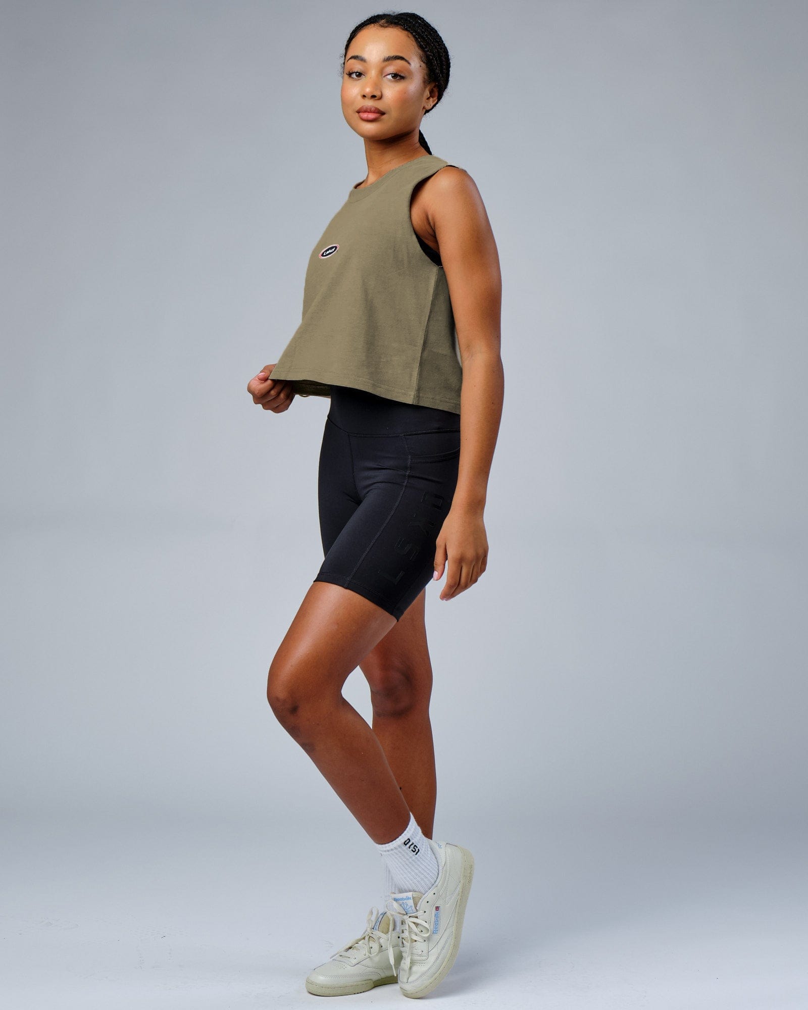 Model wearing Circa 2003 Muscle Tank - Laurel Oak