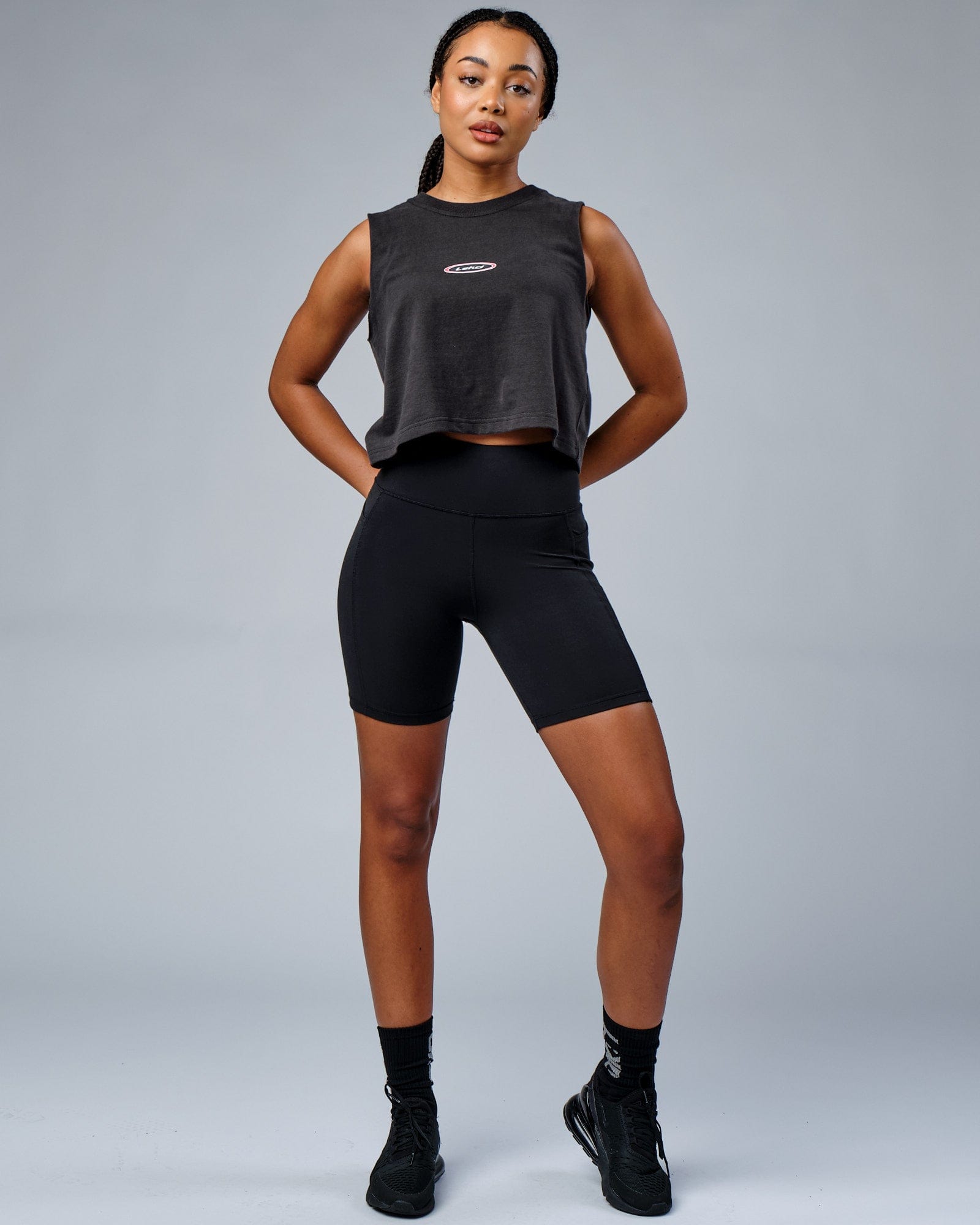 Model wearing Circa 2003 Muscle Tank - Phantom