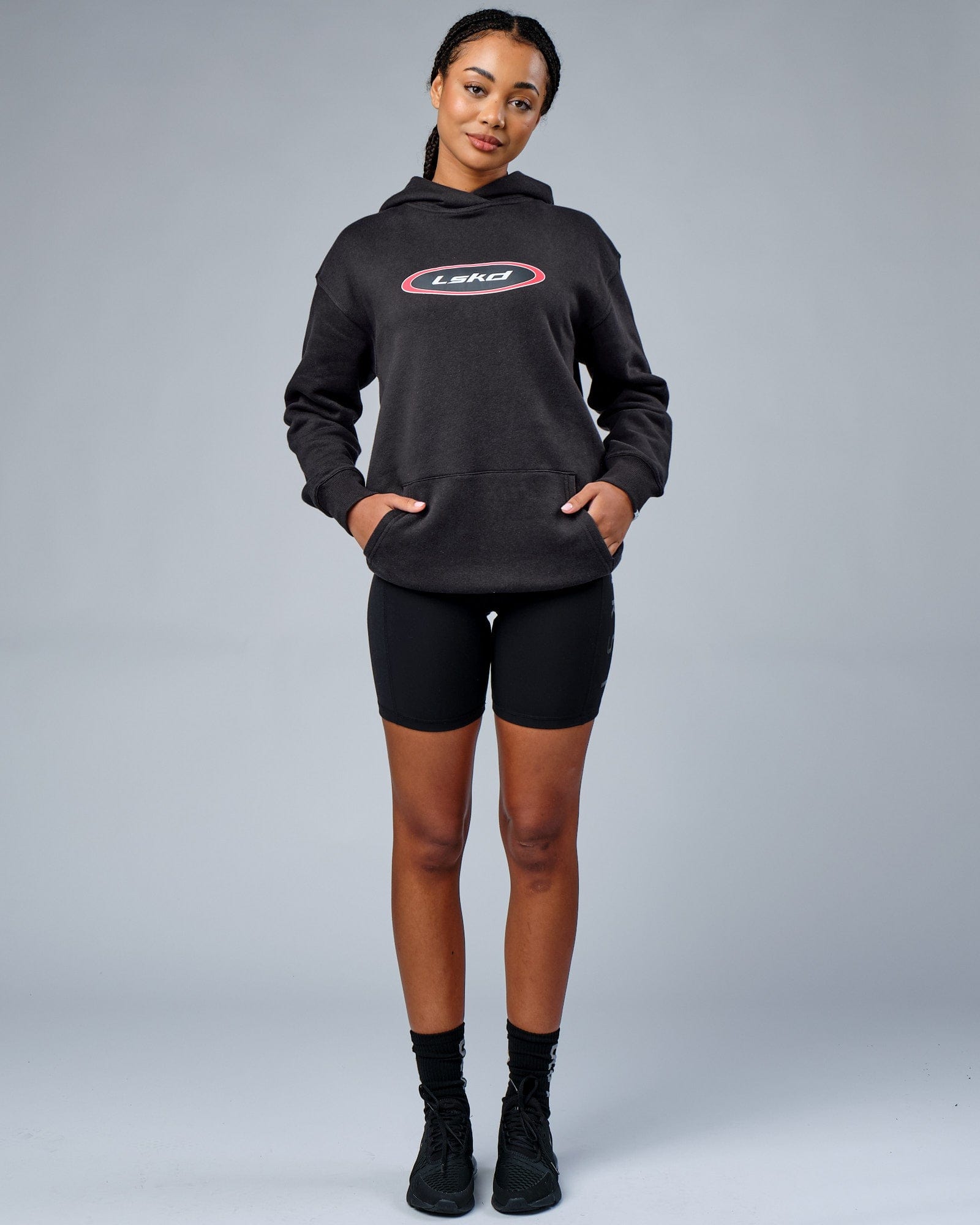 Model wearing Unisex Circa 2003 Oversize Hoodie - Phantom