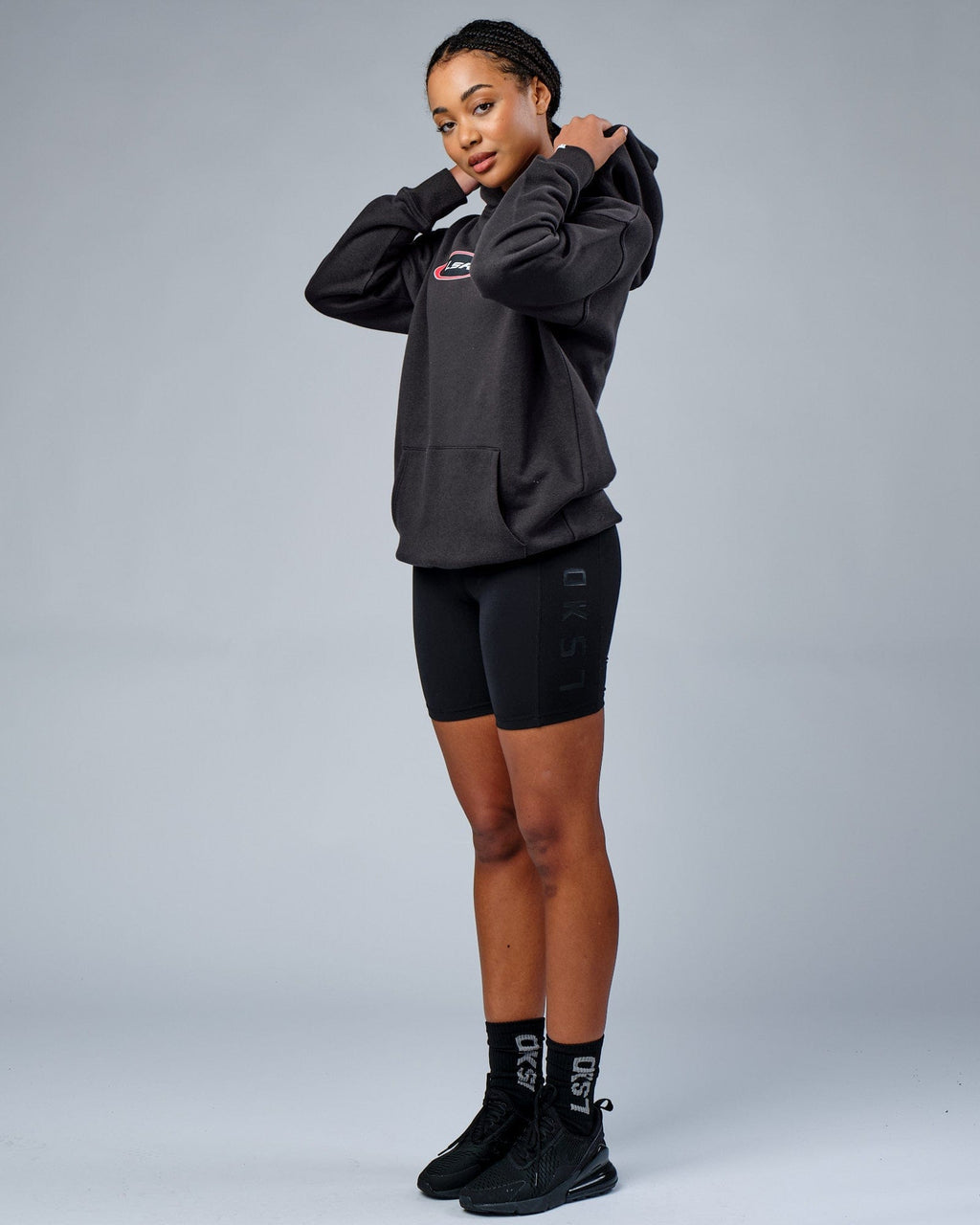 Model wearing Unisex Circa 2003 Oversize Hoodie - Phantom