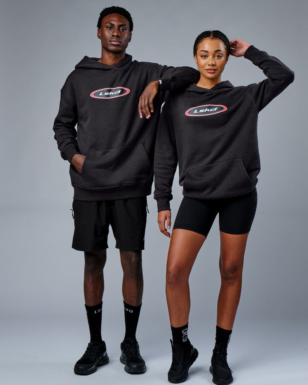 Model wearing Unisex Circa 2003 Oversize Hoodie - Phantom