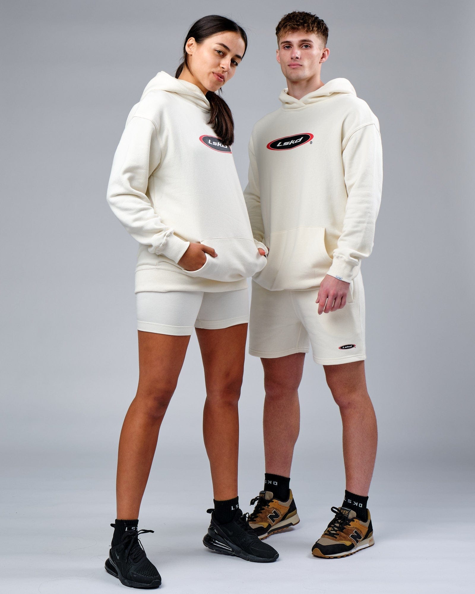 Model wearing Unisex Circa 2003 Oversize Hoodie - Cream