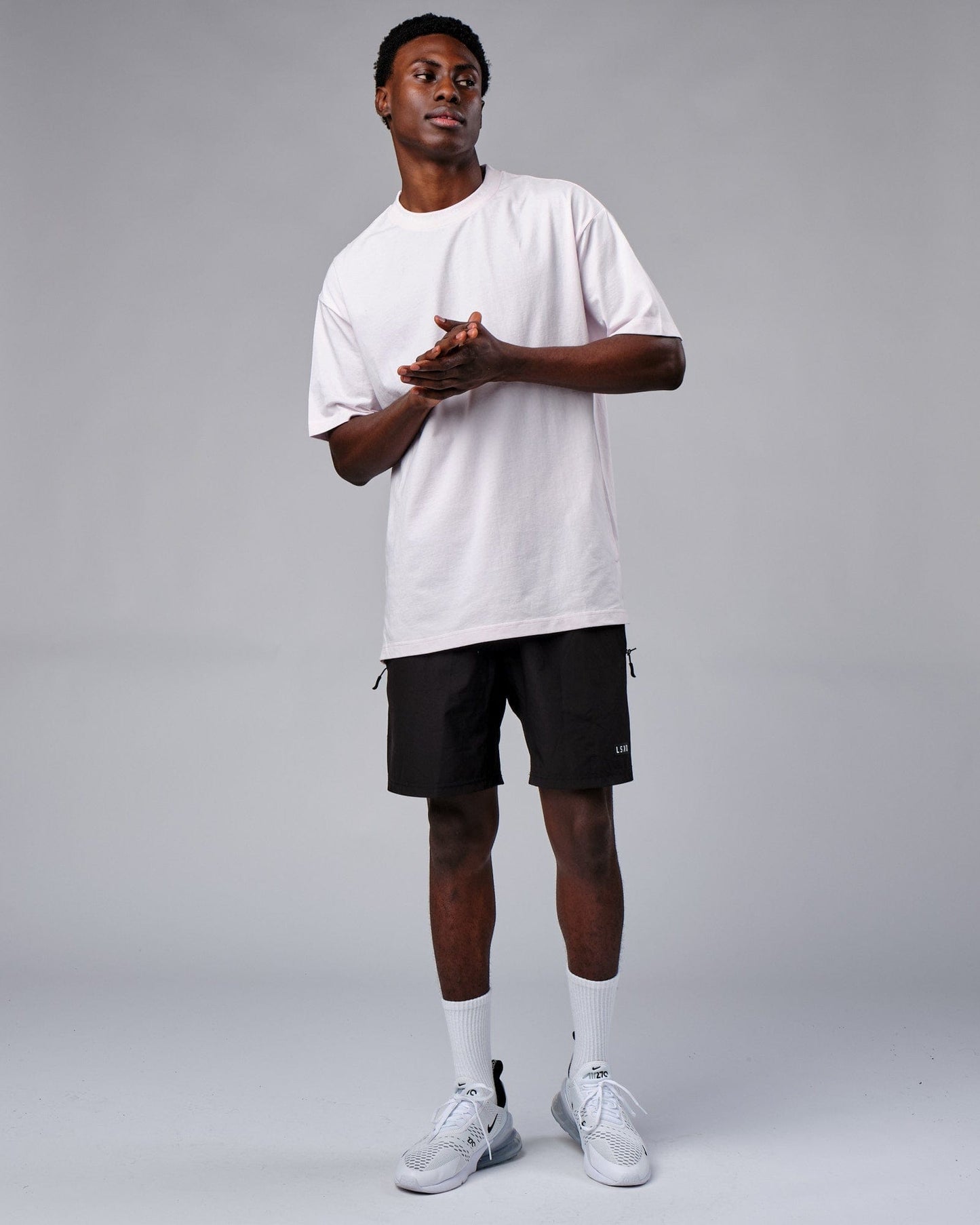 Model wearing Laps Tee Oversize - Orchid Ice