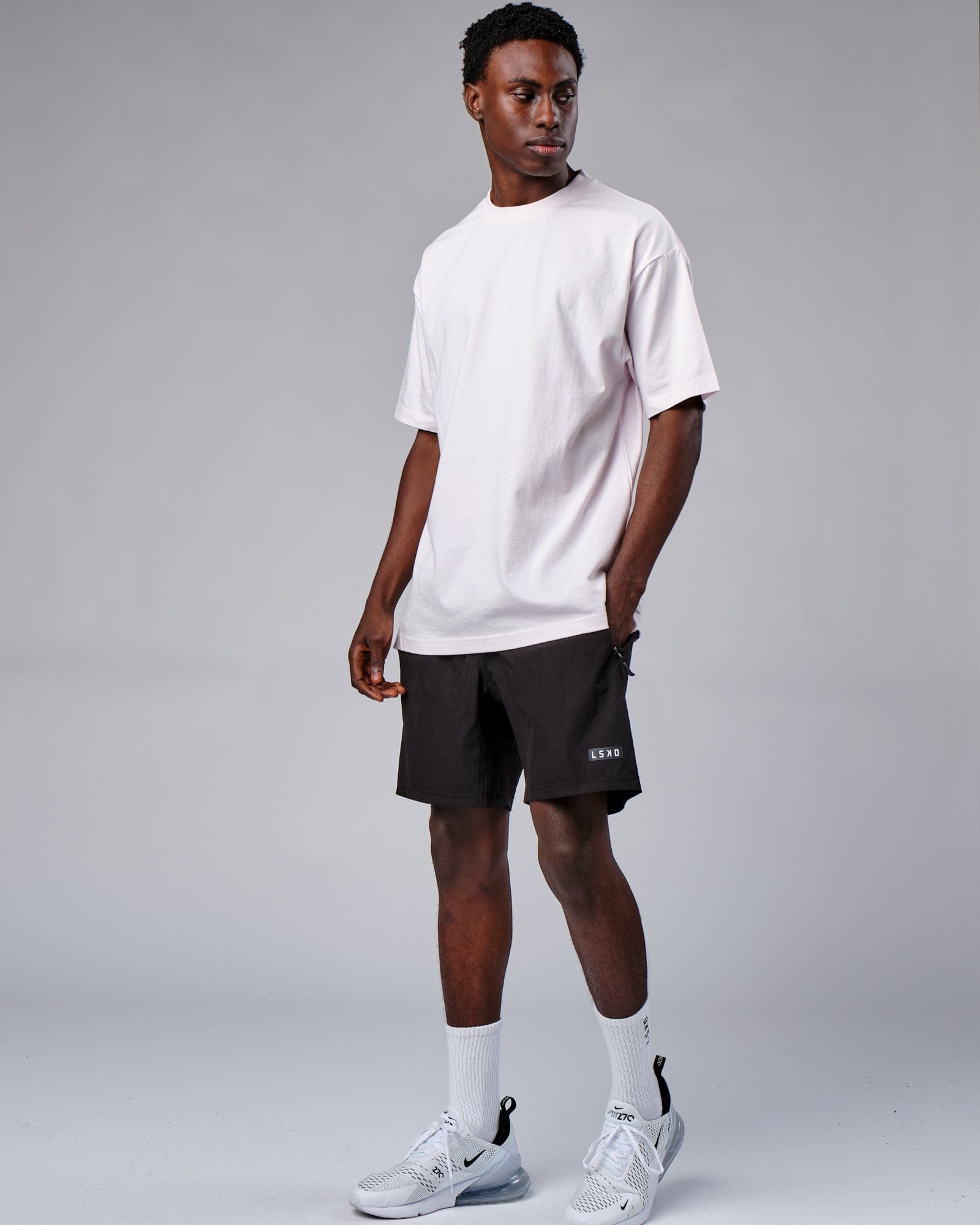 Model wearing Laps Tee Oversize - Orchid Ice