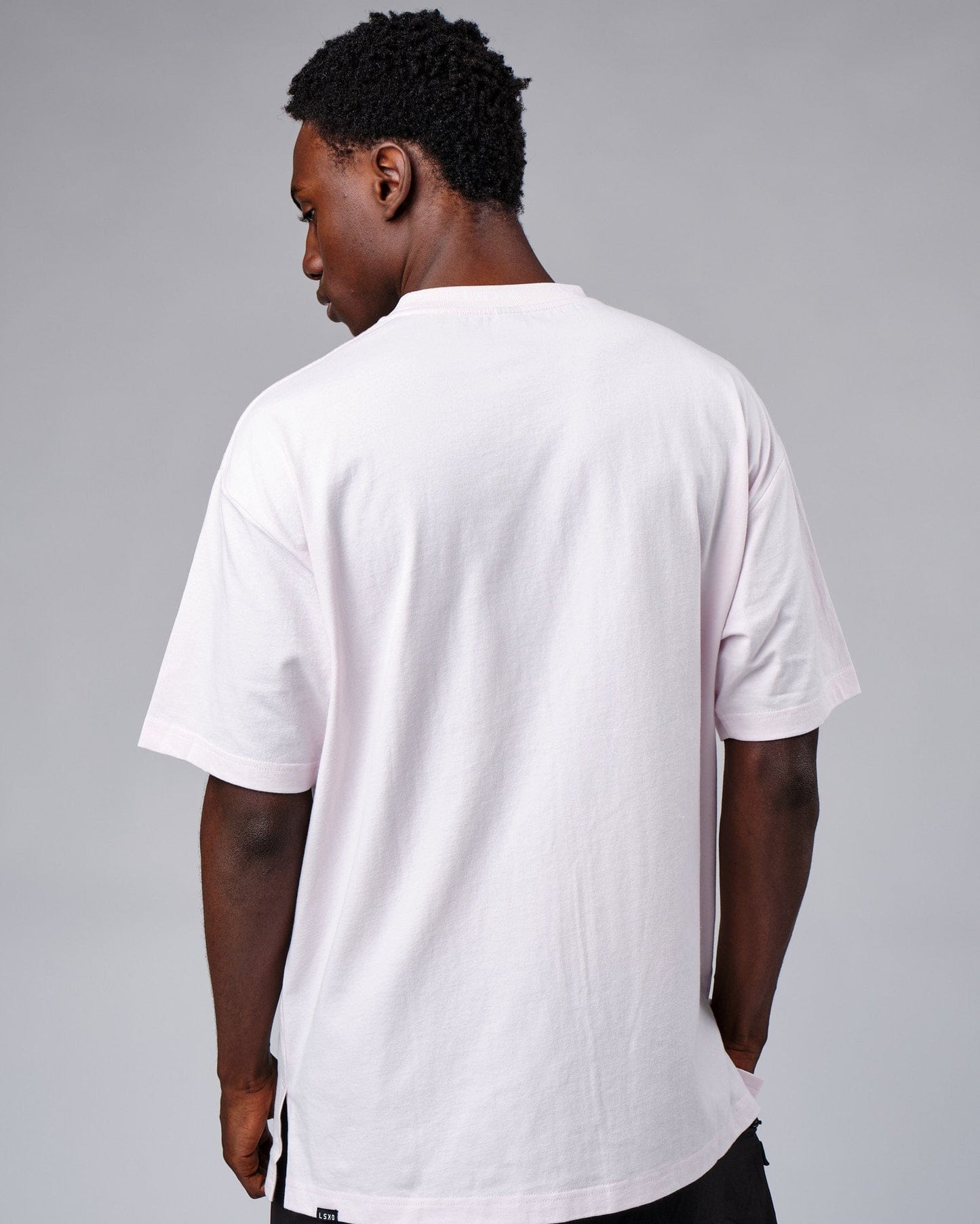 Model wearing Laps Tee Oversize - Orchid Ice