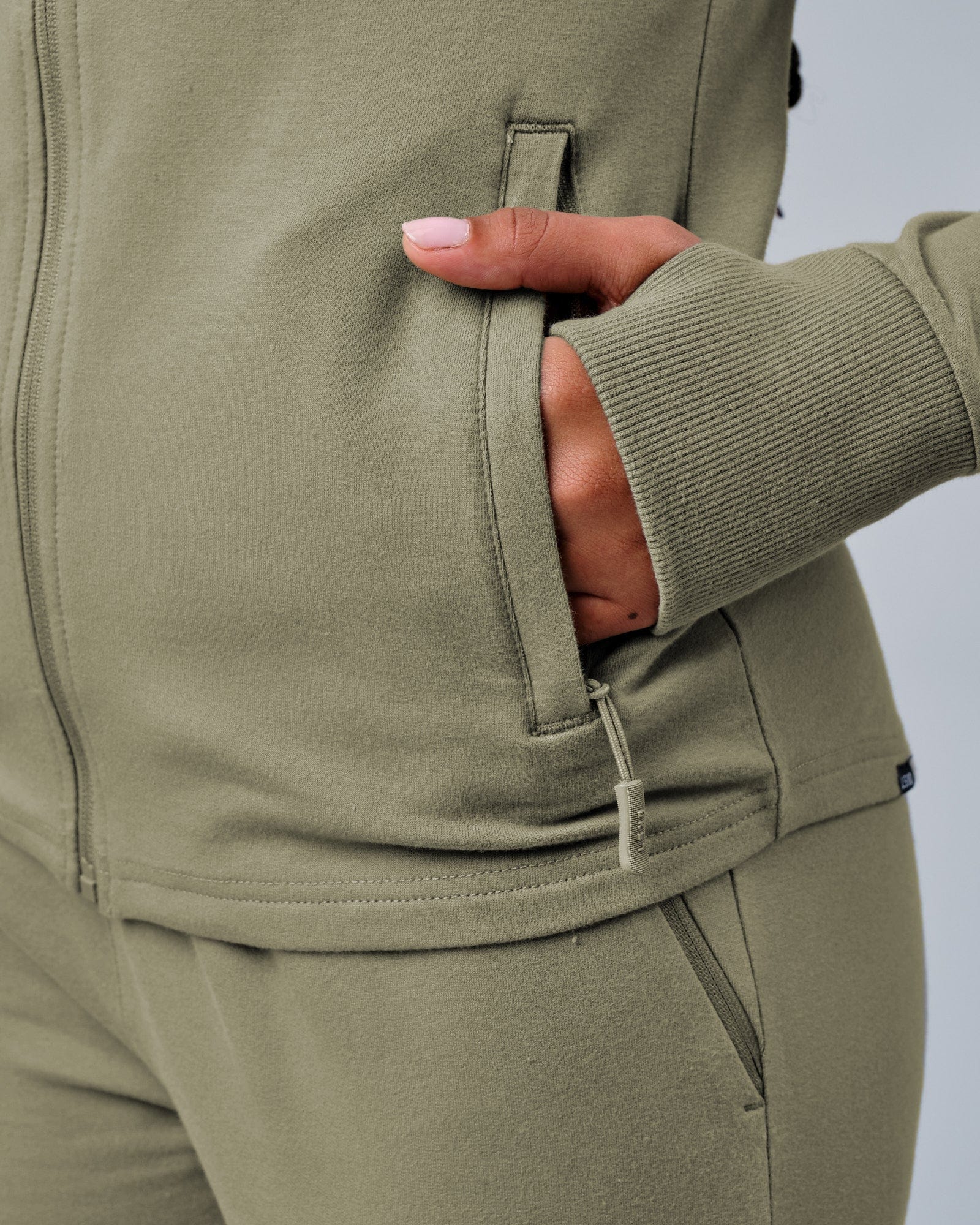 Model wearing PB Zip Through Hoodie - Dusty Olive