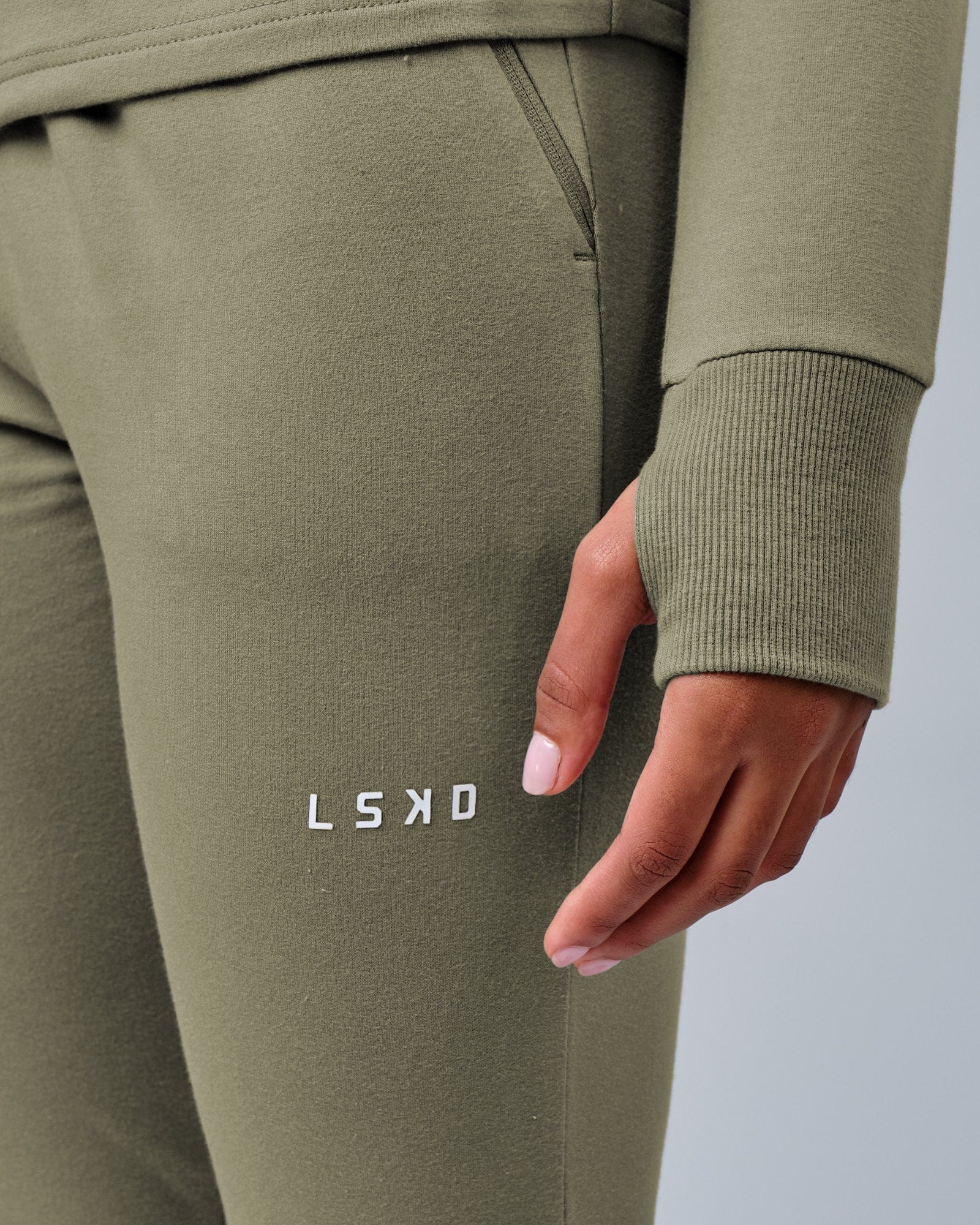 Model wearing PB Zip Through Hoodie - Dusty Olive