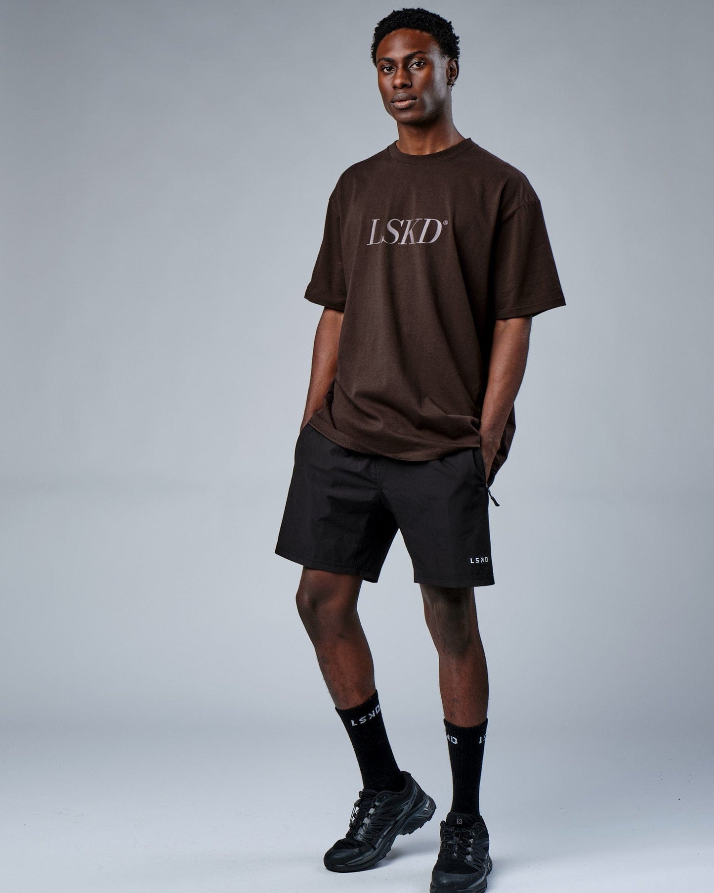 Model wearing IT Tee Oversize - Dark Walnut