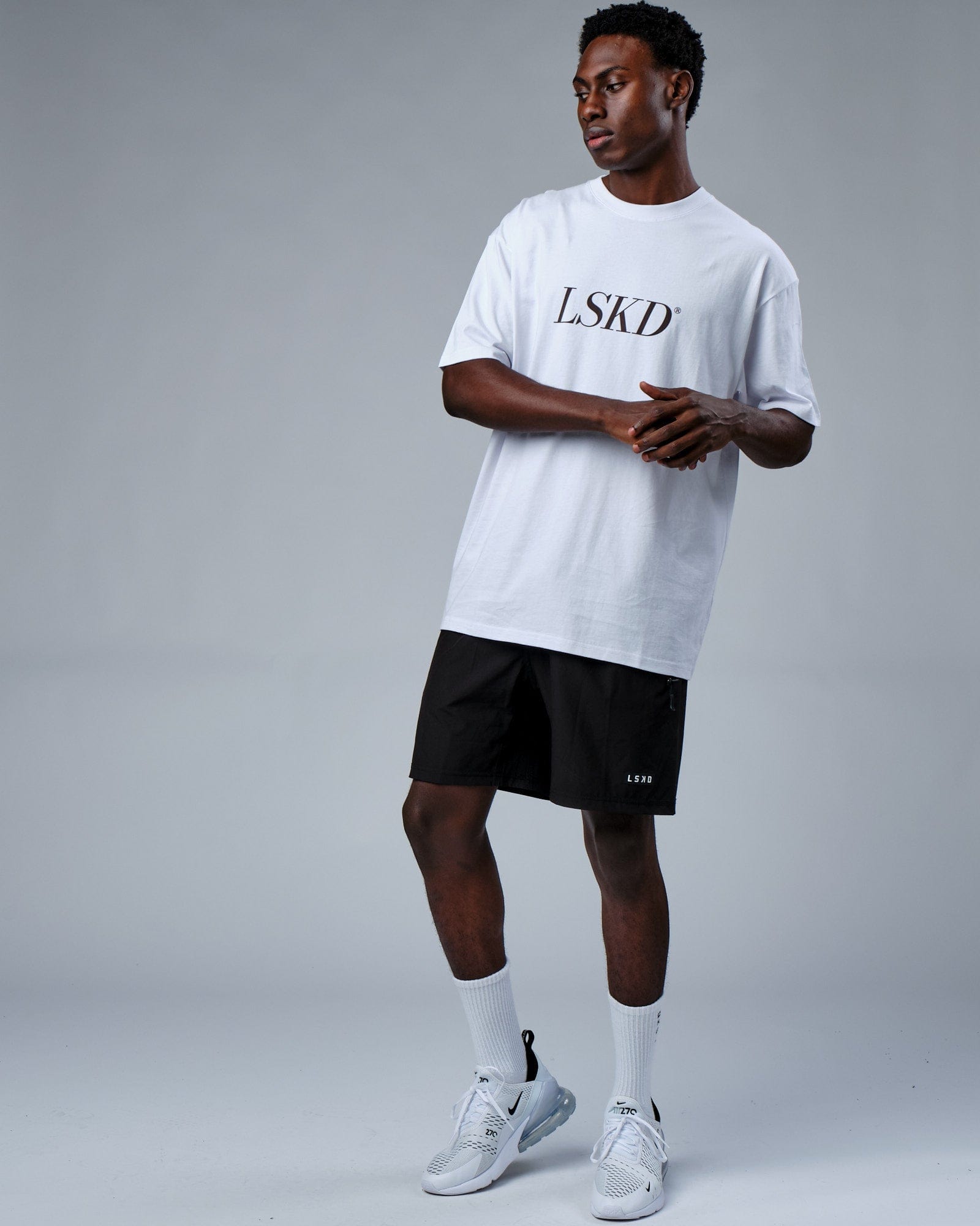 Model wearing IT Tee Oversize - White-Walnut