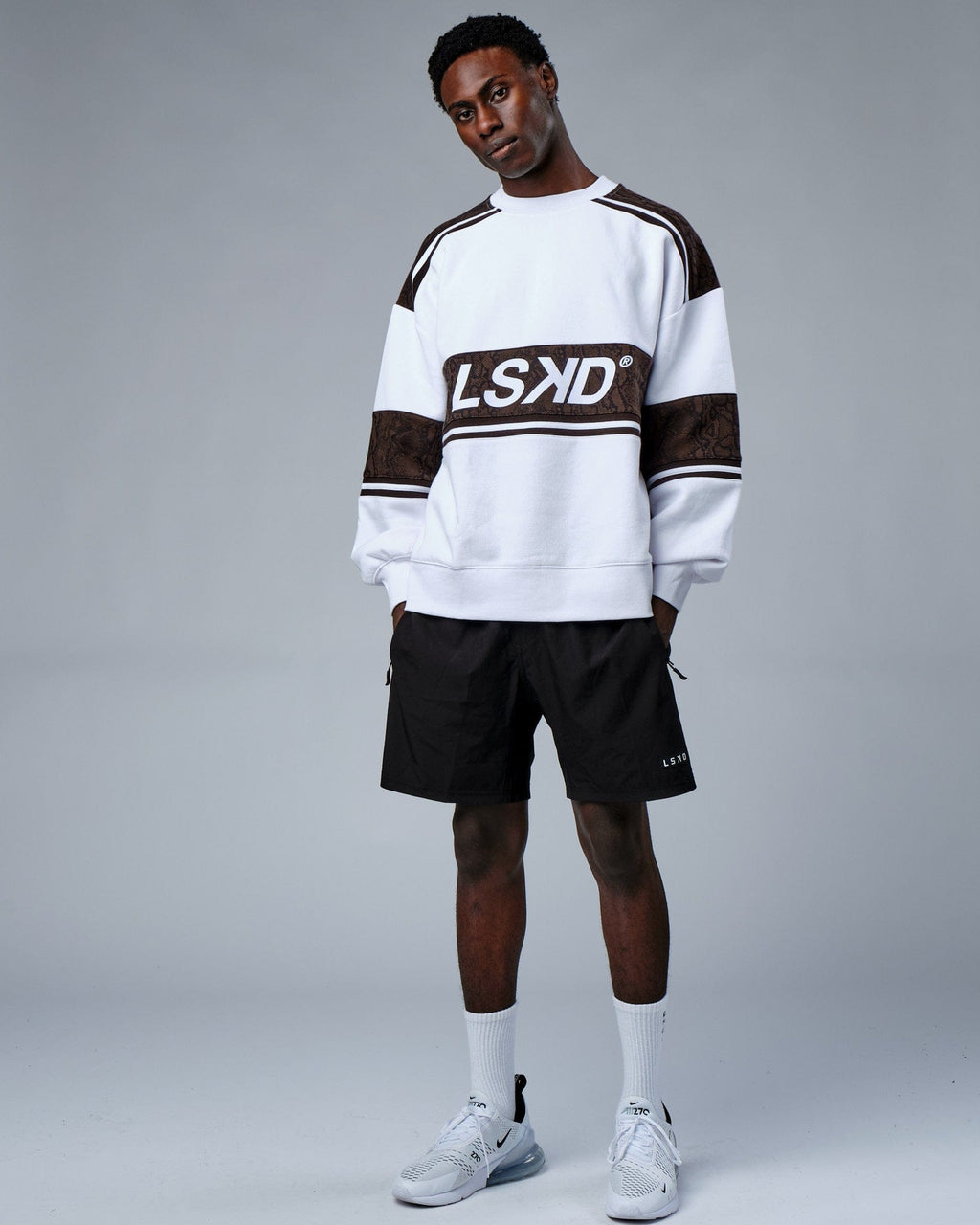 Model wearing Unisex A-Team Sweater Oversize - White-Walnut Snakeskin