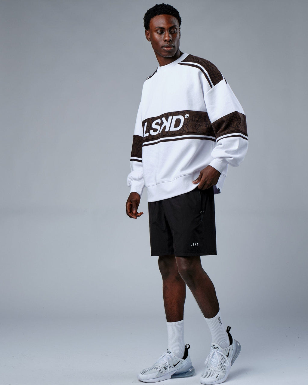 Model wearing Unisex A-Team Sweater Oversize - White-Walnut Snakeskin