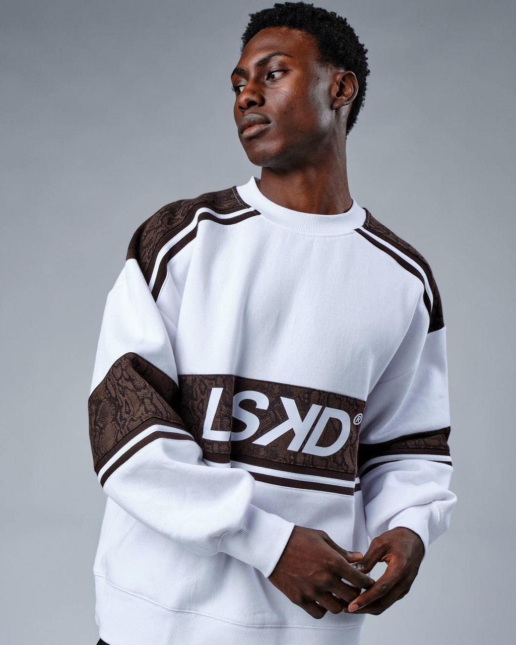 Model wearing Unisex A-Team Sweater Oversize - White-Walnut Snakeskin