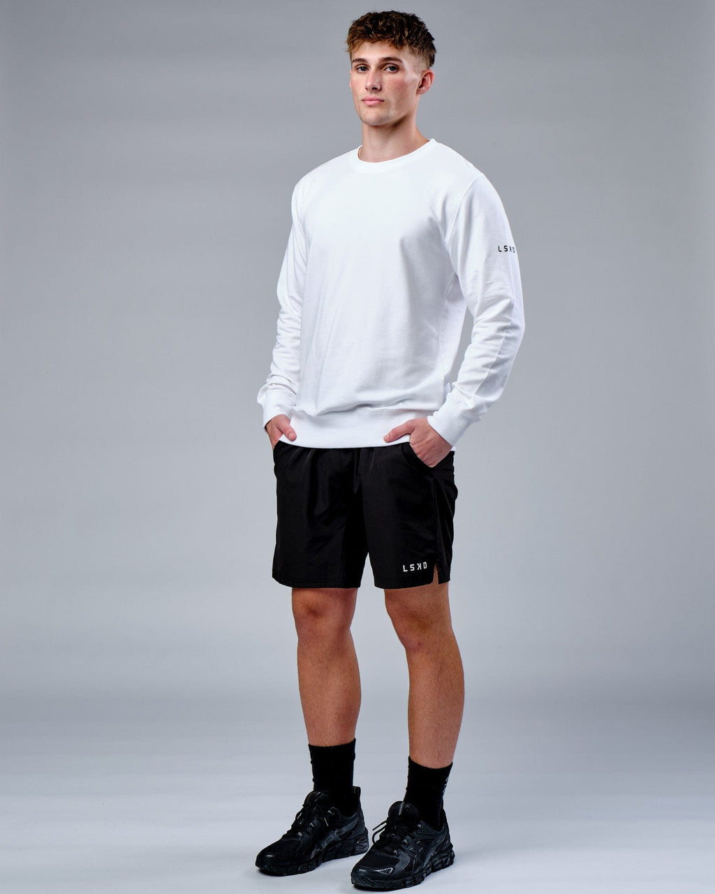 Model wearing Rival FLXFleece Training Fit Sweater - White