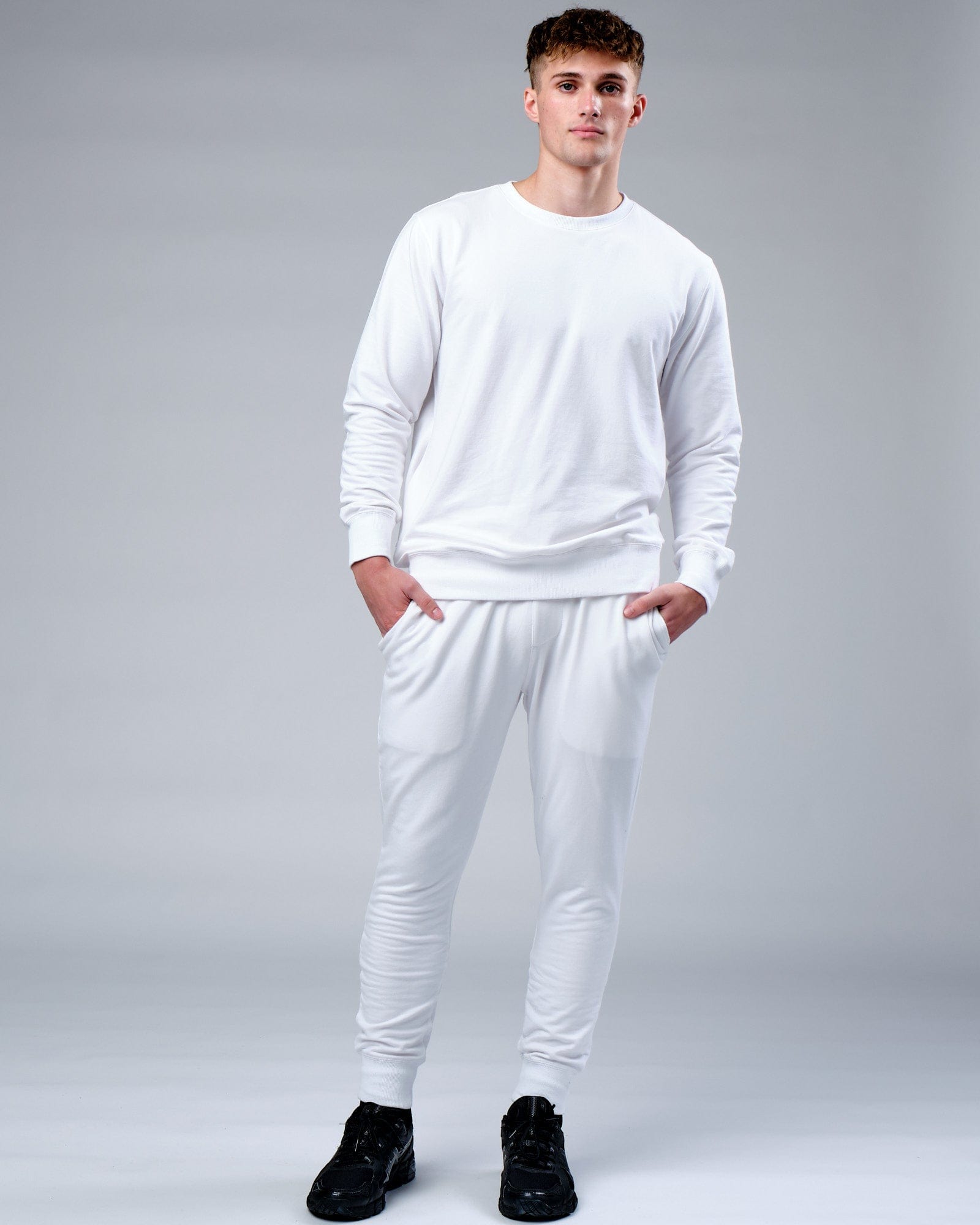 Model wearing Rival FLXFleece Track Pant - White