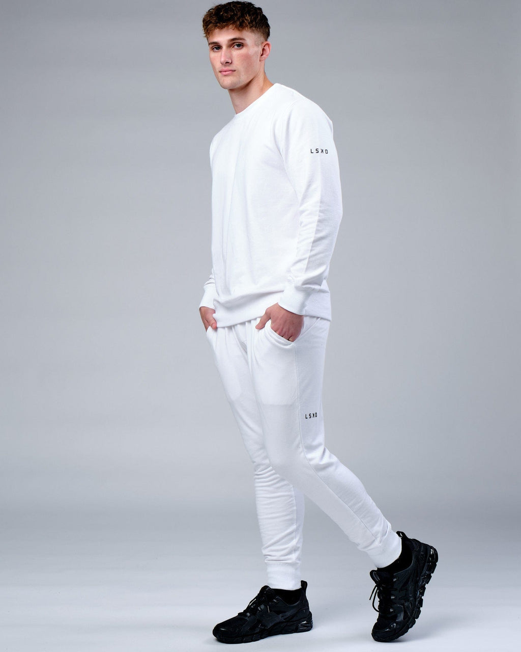 Model wearing Rival FLXFleece Track Pant - White