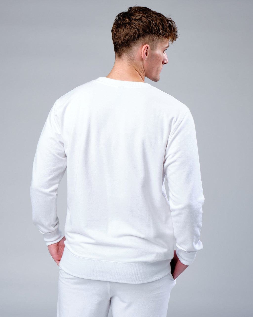 Model wearing Rival FLXFleece Training Fit Sweater - White