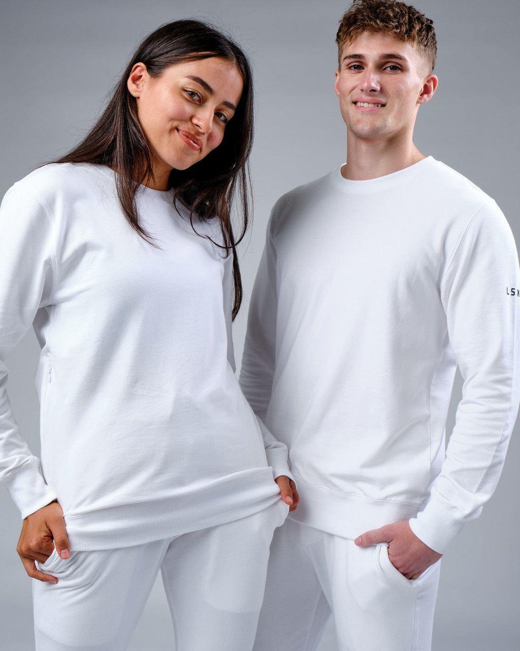 Model wearing Unisex Rival FLXFleece Training Fit Sweater - White