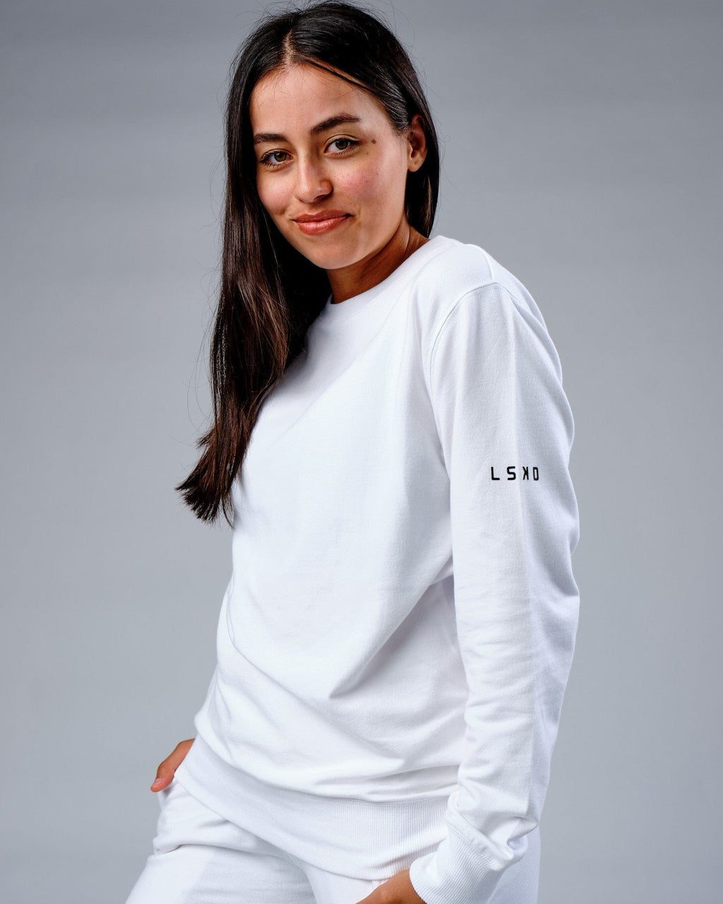 Model wearing Unisex Rival FLXFleece Training Fit Sweater - White