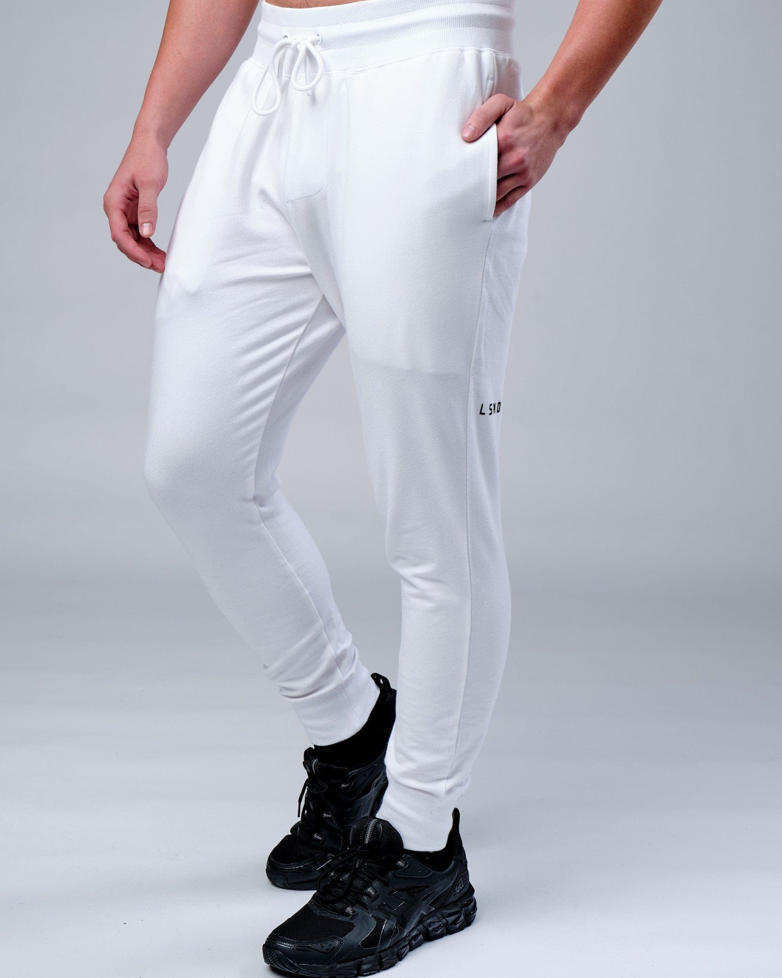 Model wearing Rival FLXFleece Track Pant - White