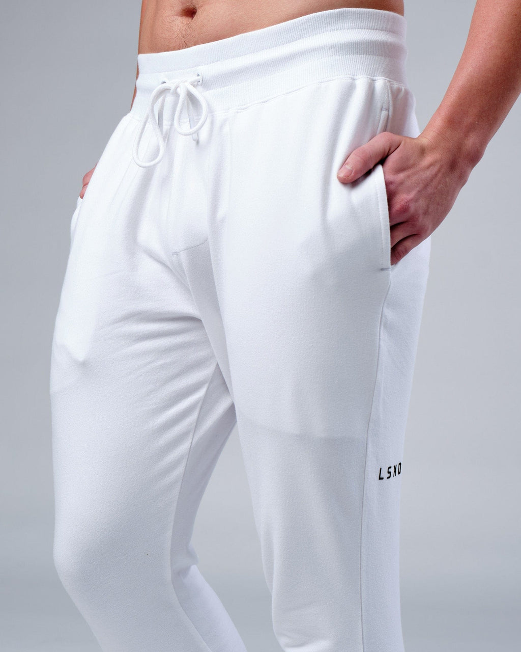 Model wearing Rival FLXFleece Track Pant - White